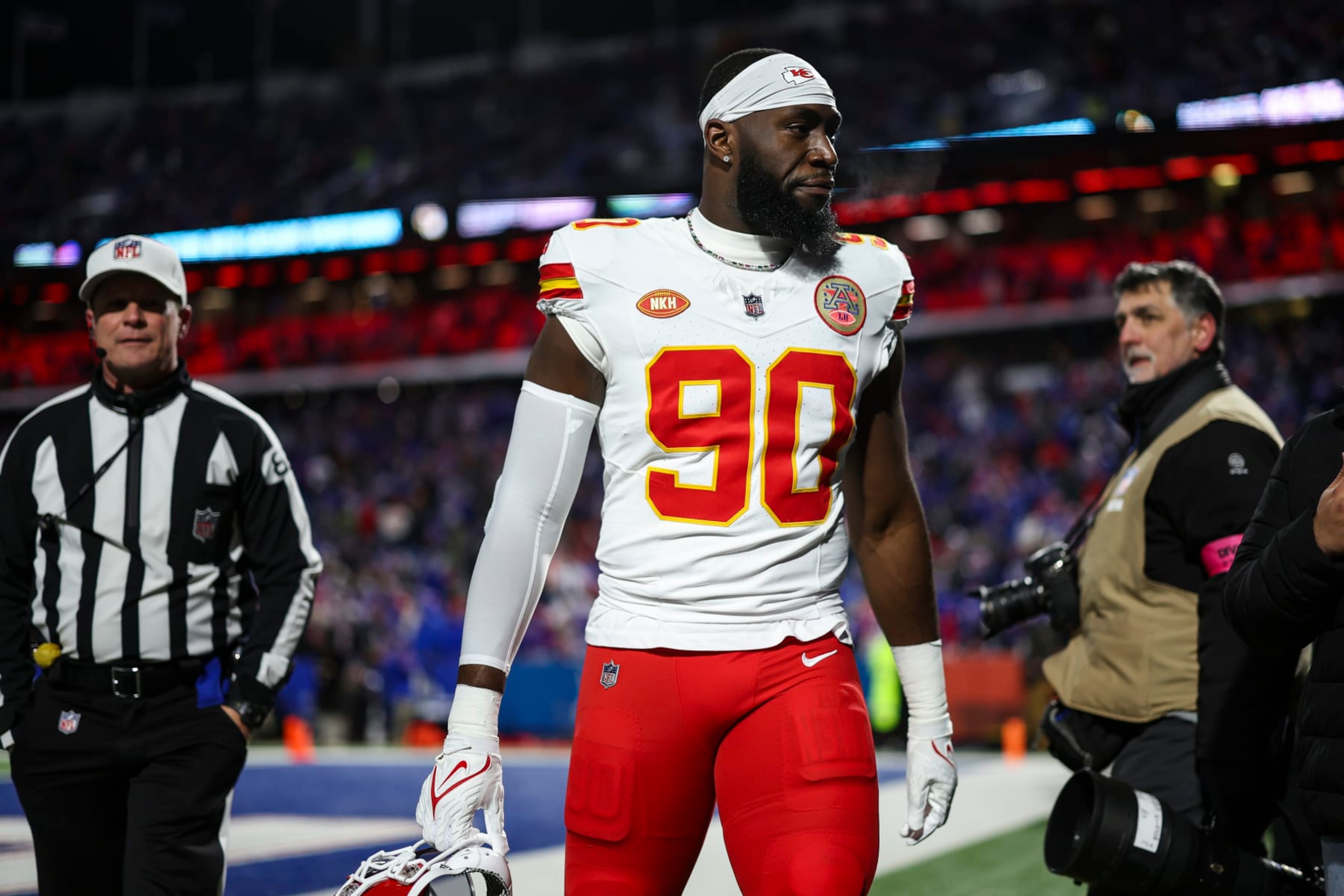 ORCHARD PARK, NY - JANUARY 21: Charles Omenihu #90 of the Kansas City Chiefs walks off of the field after warmups prior to an NFL divisional round playoff football game against the Buffalo Bills at Highmark Stadium on January 21, 2024 in Orchard Park, New York. (Photo by Perry Knotts/Getty Images)