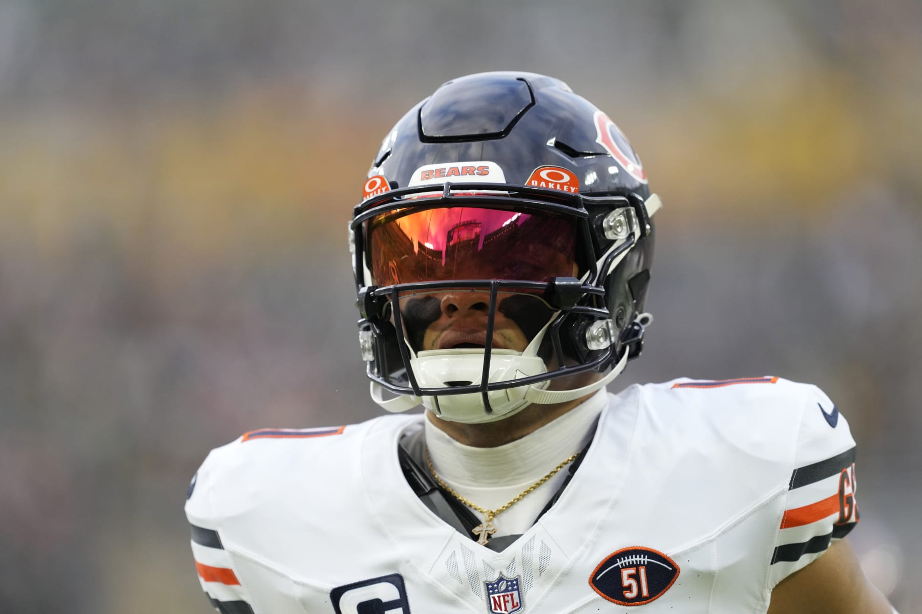 GREEN BAY, WISCONSIN - JANUARY 07: Justin Fields #1 of the Chicago Bears warms up before a game against the Green Bay Packers at Lambeau Field on January 07, 2024 in Green Bay, Wisconsin. (Photo by Patrick McDermott/Getty Images)