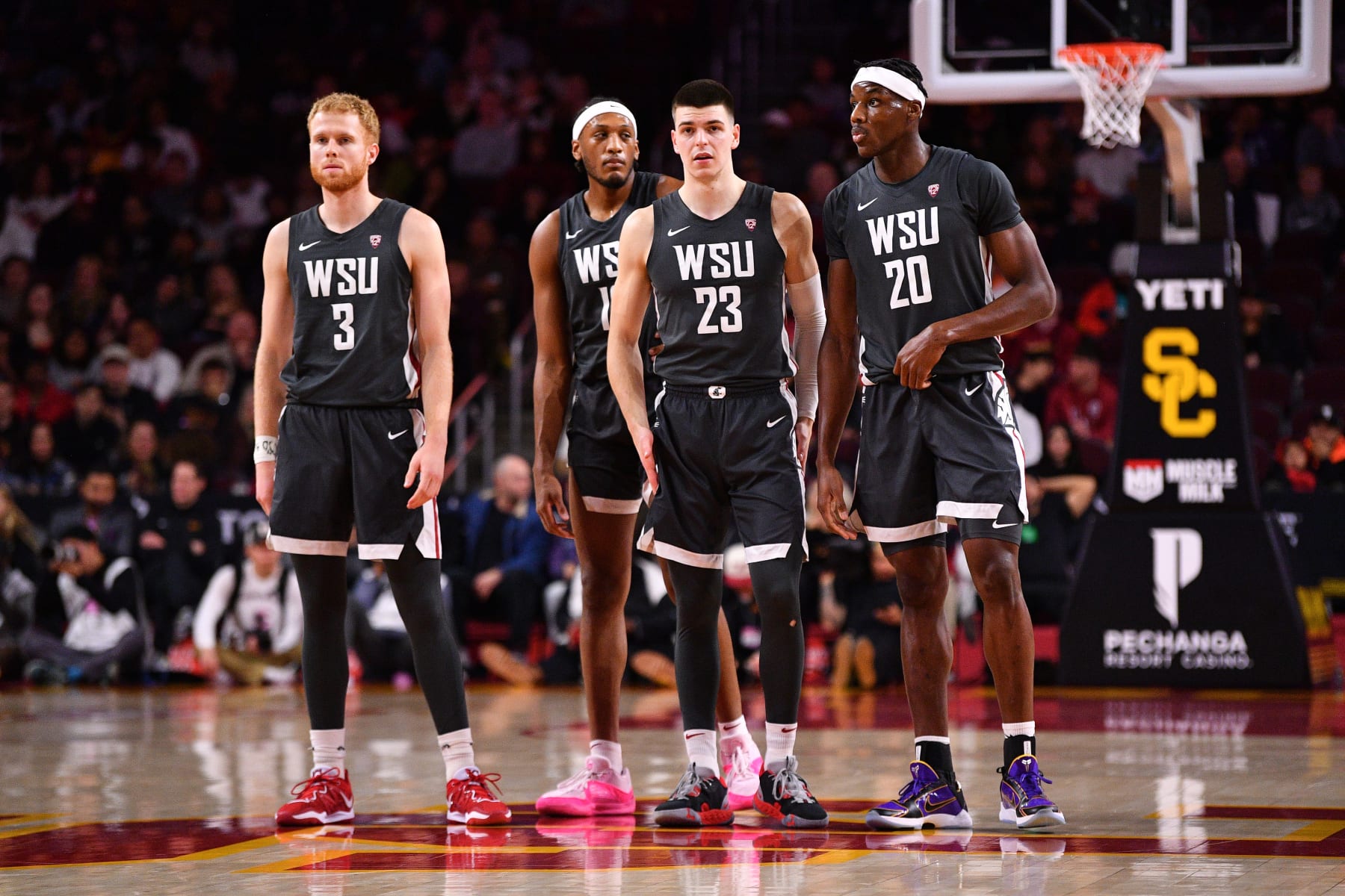 LOS ANGELES, CA - JANUARY 10: Washington State Cougars guard Jabe Mullins (3), Washington State Cougars forward Isaac Jones (13), Washington State Cougars forward Andrej Jakimovski (23) and Washington State Cougars center Rueben Chinyelu (20) look on during the college basketball game between the Washington State Cougars and the USC Trojans on January 10, 2024 at Galen Center in Los Angeles, CA. (Photo by Brian Rothmuller/Icon Sportswire via Getty Images)