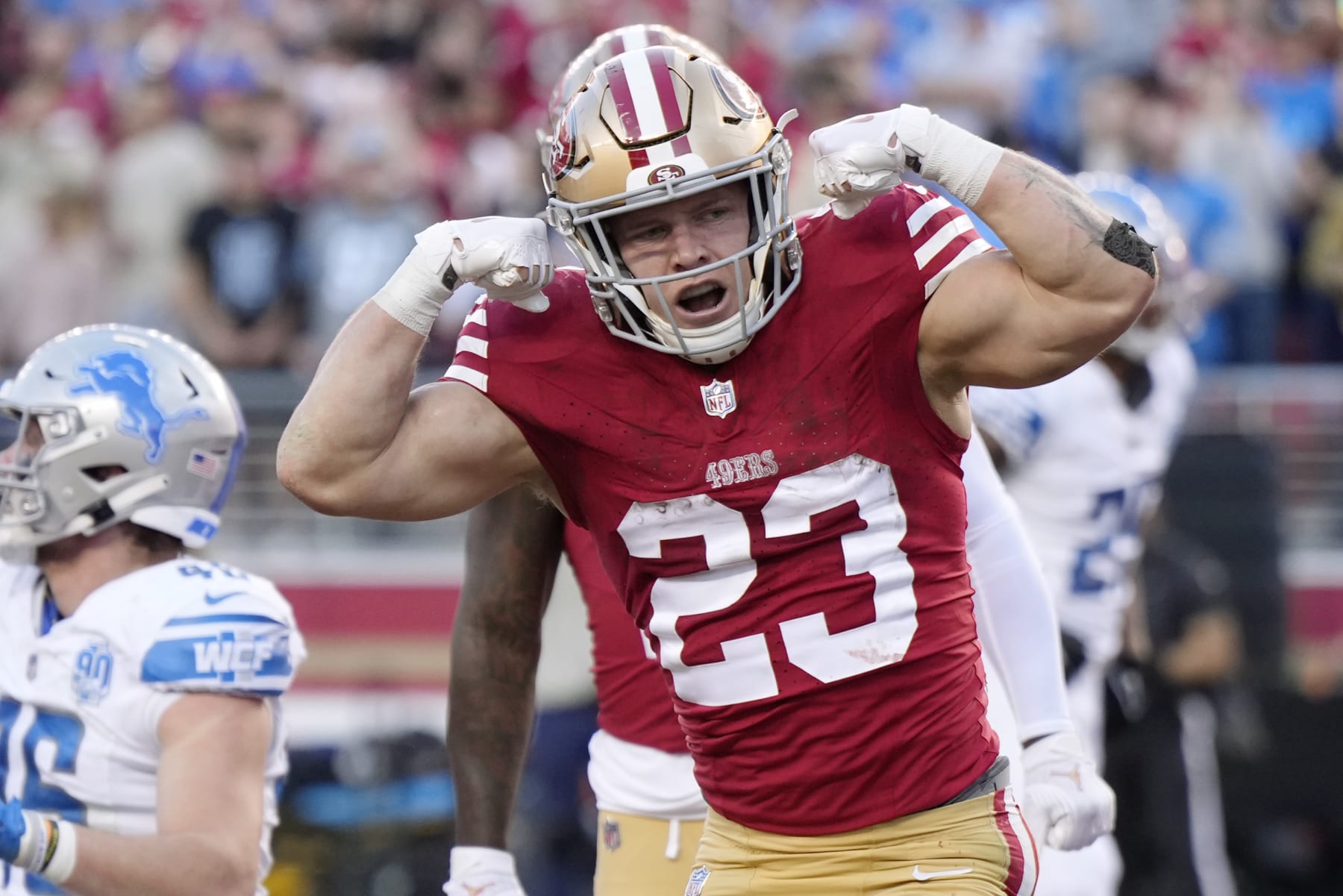 SANTA CLARA, CALIFORNIA - JANUARY 28: Christian McCaffrey #23 of the San Francisco 49ers celebrates after scoring a touchdown during the second quarter against the Detroit Lions in the NFC Championship Game at Levi's Stadium on January 28, 2024 in Santa Clara, California. (Photo by Thearon W. Henderson/Getty Images)