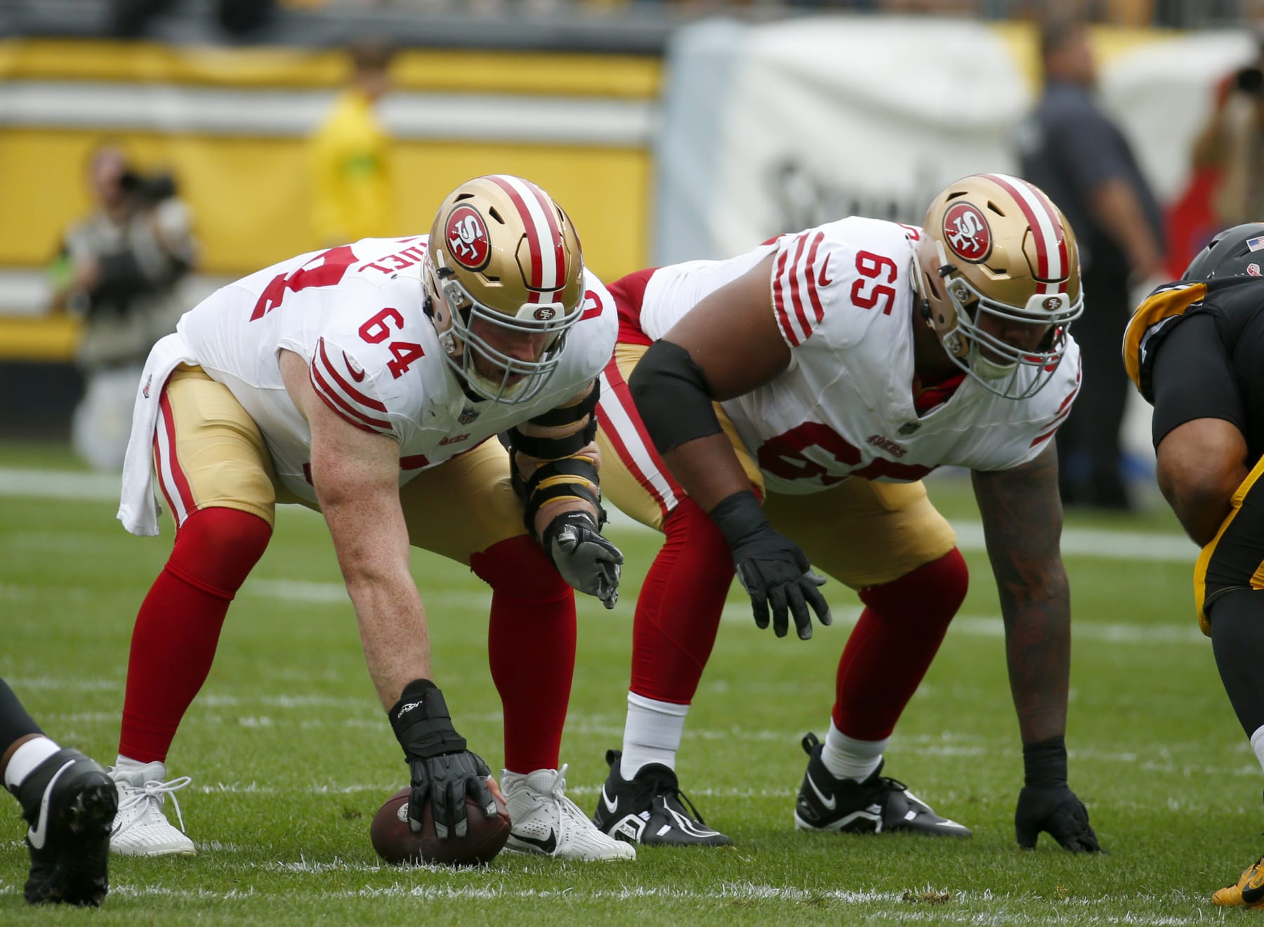 Jake Brendel (64) and Aaron Banks (65)