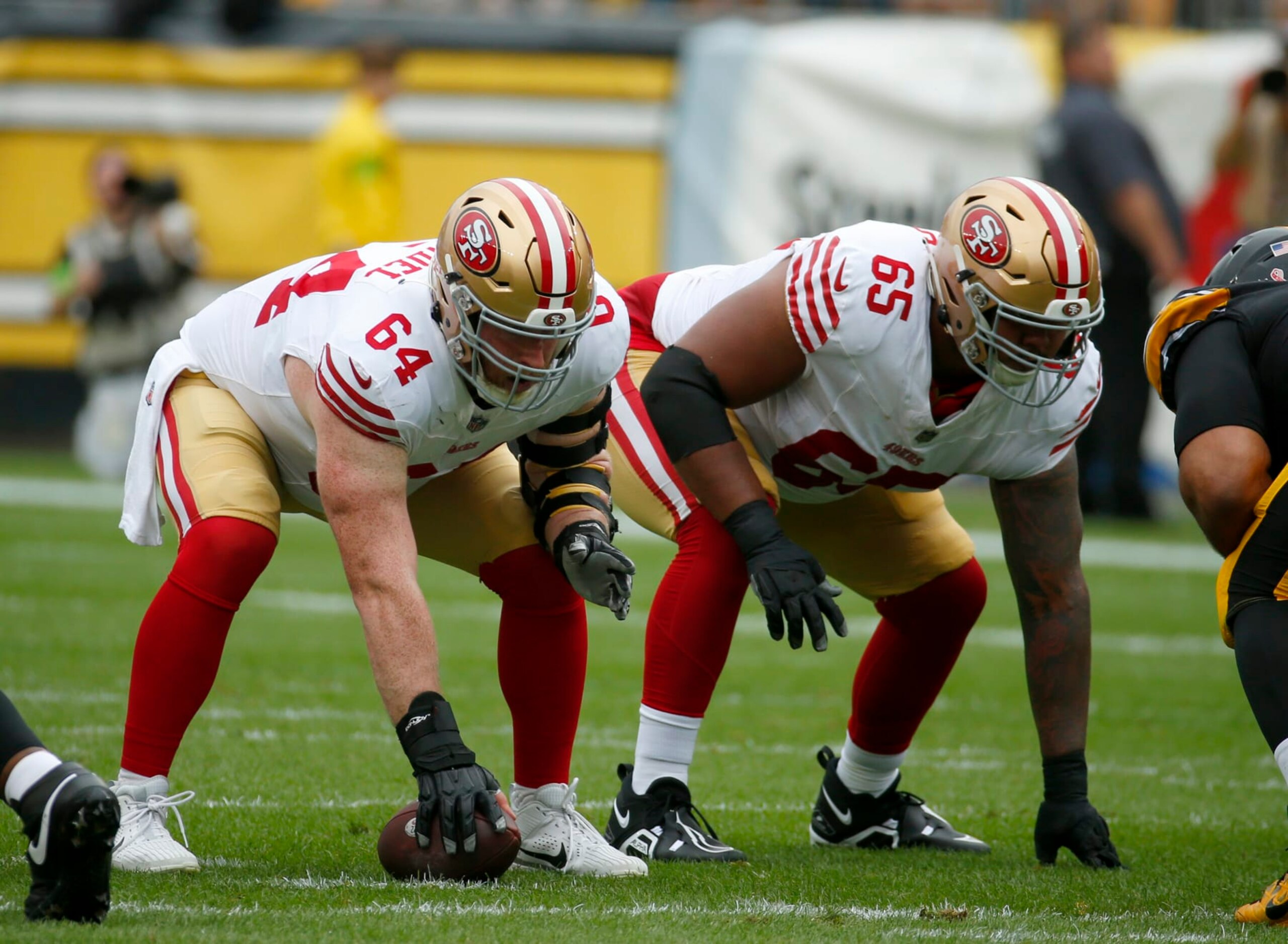 Jake Brendel (64) and Aaron Banks (65)