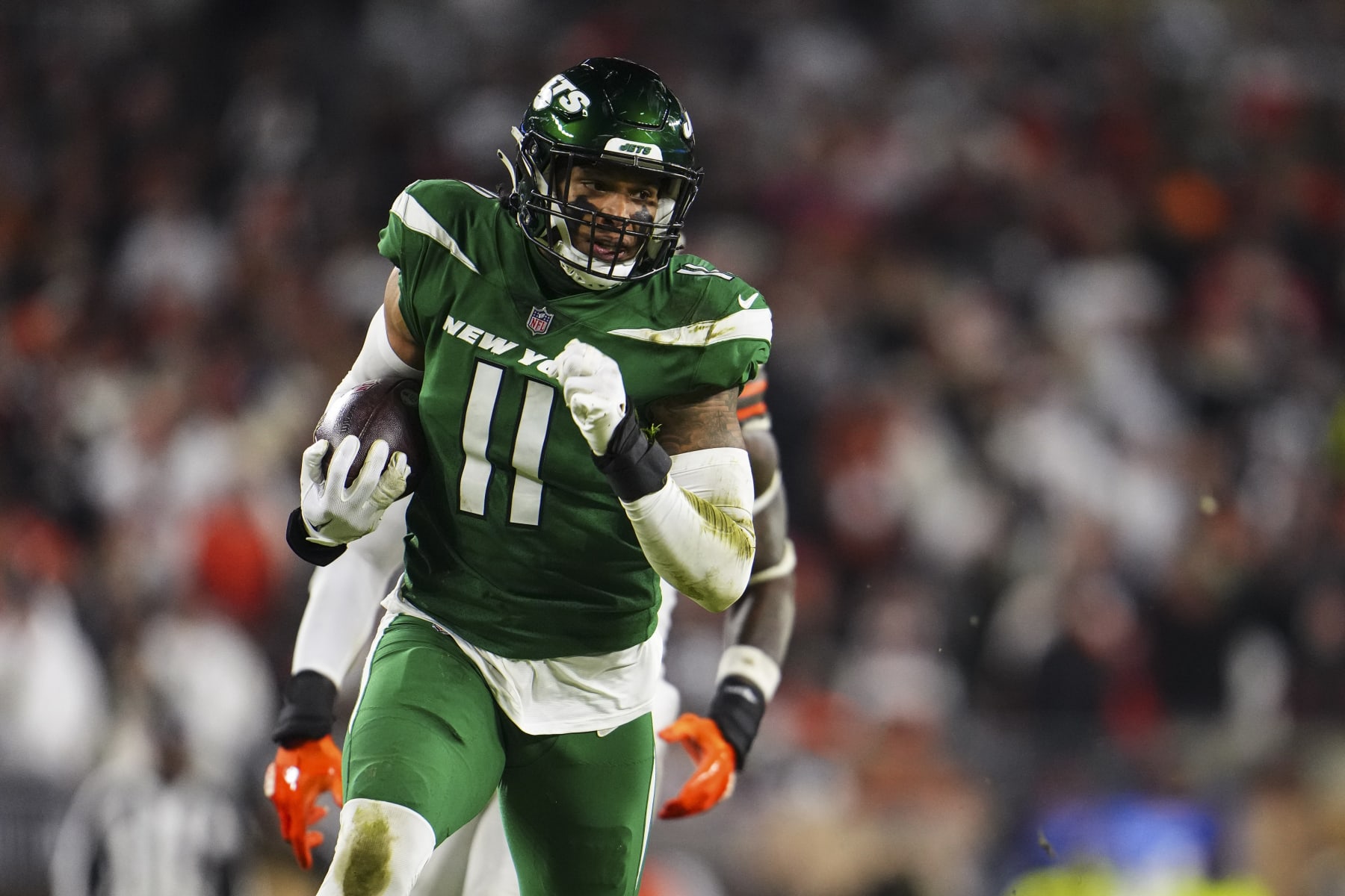 CLEVELAND, OH - DECEMBER 28: Jermaine Johnson #11 of the New York Jets runs the ball during an NFL football game against the Cleveland Browns at Cleveland Browns Stadium on December 28, 2023 in Cleveland, Ohio. (Photo by Cooper Neill/Getty Images)