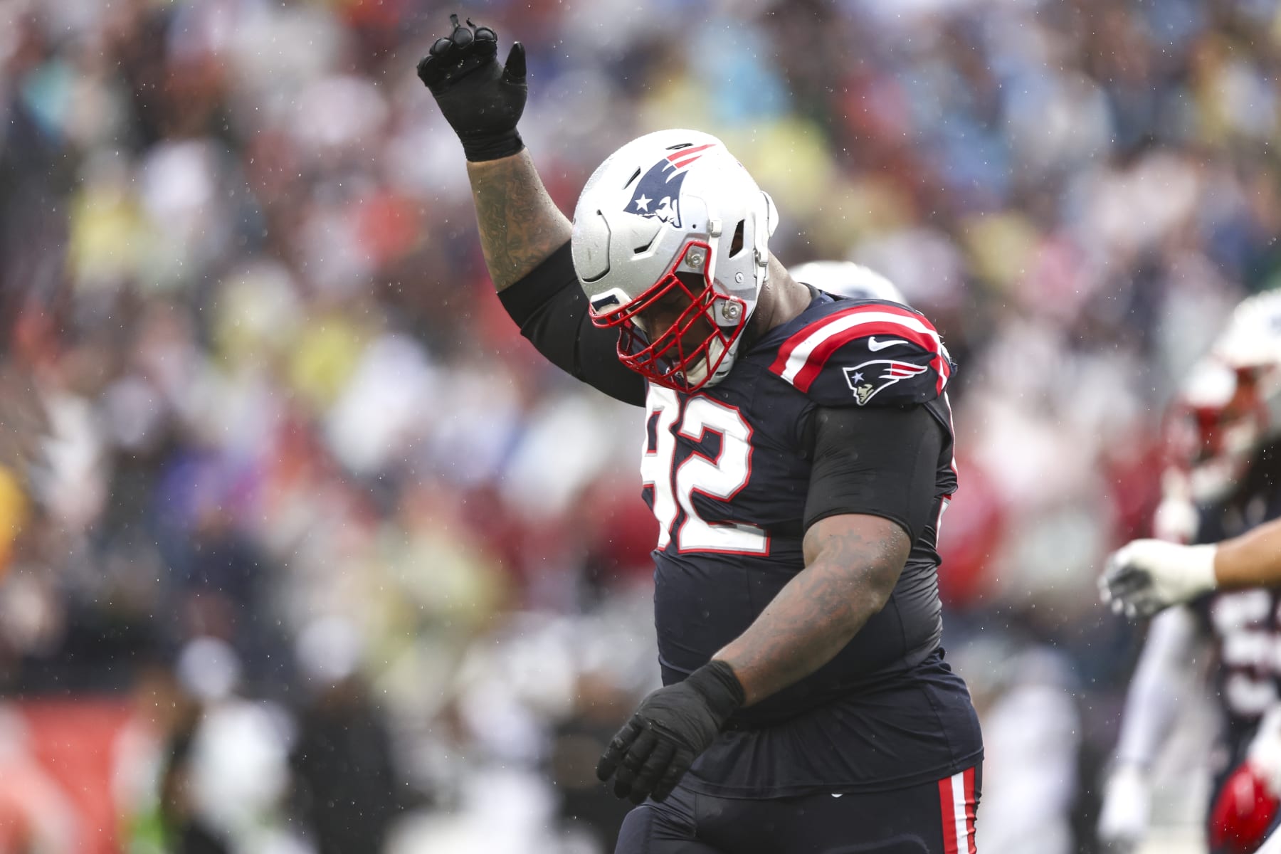 FOXBOROUGH, MA - SEPTEMBER 10: Davon Godchaux #92 of the New England Patriots celebrates after a play during an NFL football game against the Philadelphia Eagles at Gillette Stadium on September 10, 2023 in Foxborough, Massachusetts. (Photo by Kevin Sabitus/Getty Images)