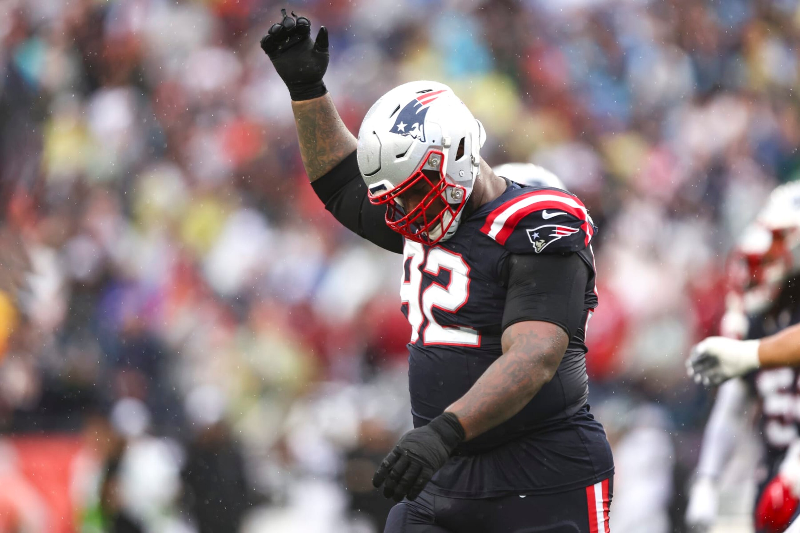 FOXBOROUGH, MA - SEPTEMBER 10: Davon Godchaux #92 of the New England Patriots celebrates after a play during an NFL football game against the Philadelphia Eagles at Gillette Stadium on September 10, 2023 in Foxborough, Massachusetts. (Photo by Kevin Sabitus/Getty Images)