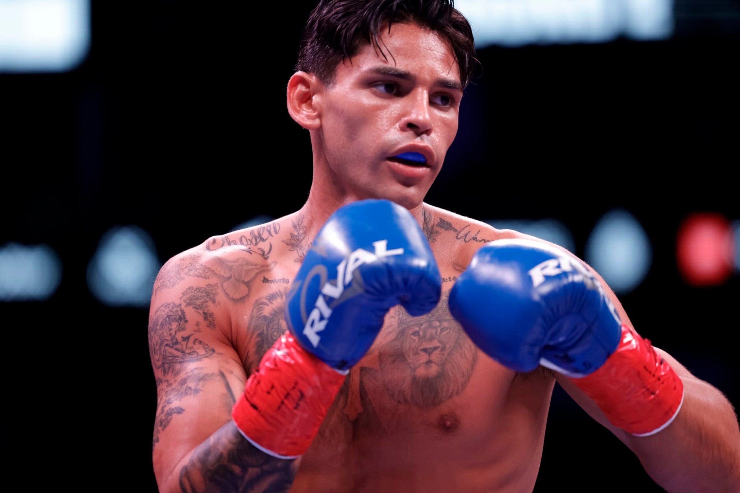 HOUSTON, TEXAS - DECEMBER 02: Ryan Garcia looks on while facing Oscar Duarte during their welterweight fight at Toyota Center on December 02, 2023 in Houston, Texas. (Photo by Carmen Mandato/Getty Images)