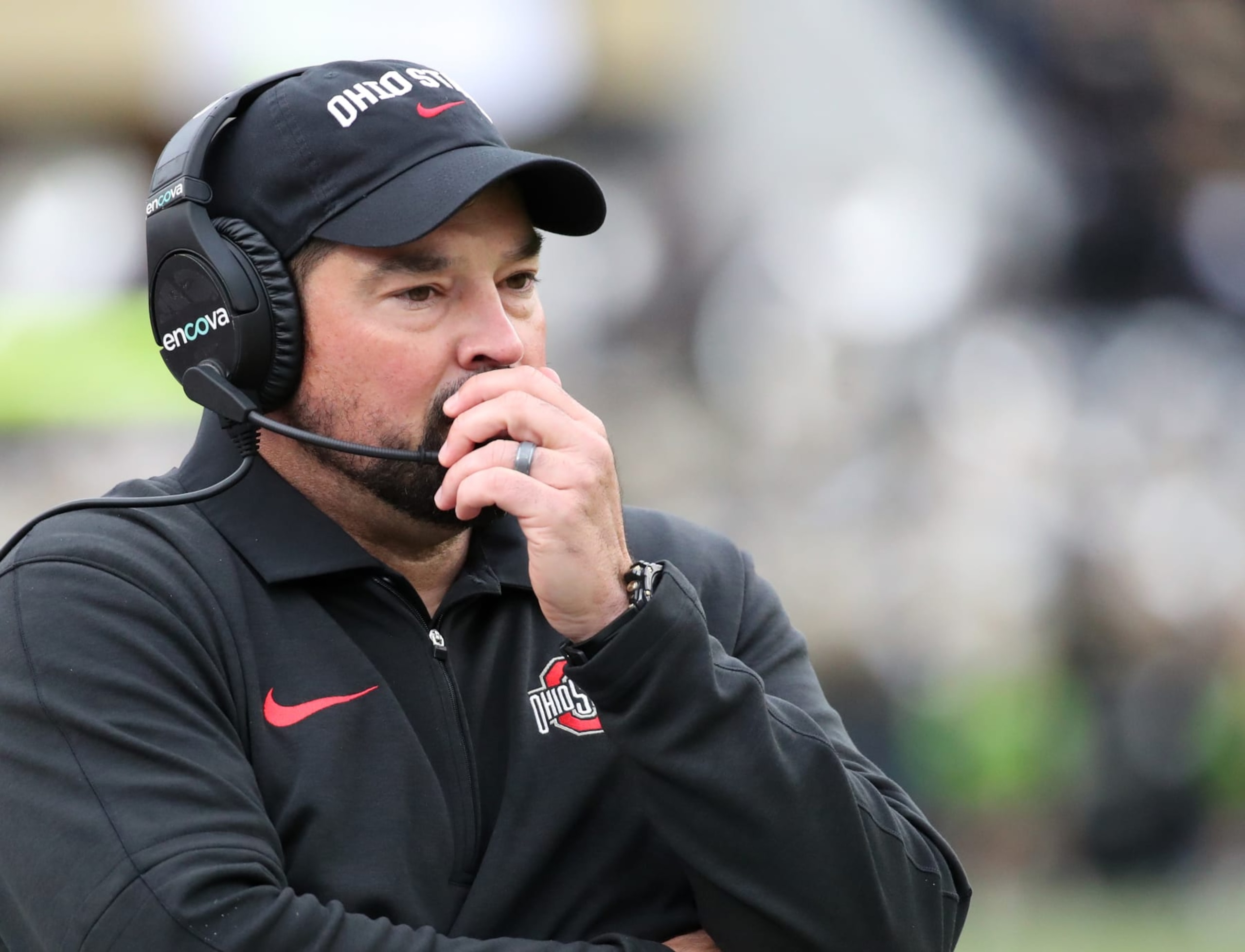 WEST LAFAYETTE, INDIANA - OCTOBER 14: Head Coach Ryan Day of the Ohio State University Buckeyes talks to his coaches on his headset during a timeout in the second quarter against the Purdue Boilermakers at Ross-Ade Stadium on October 14, 2023 in West Lafayette, Indiana. (Photo by Bruce Yeung/Getty Images) WEST LAFAYETTE, INDIANA - OCTOBER 14: Head Coach Ryan Day of the Ohio State University Buckeyes talks to his coaches on his headset during a timeout in the second quarter against the Purdue Boilermakers at Ross-Ade Stadium on October 14, 2023 in West Lafayette, Indiana. (Photo by Bruce Yeung/Getty Images)