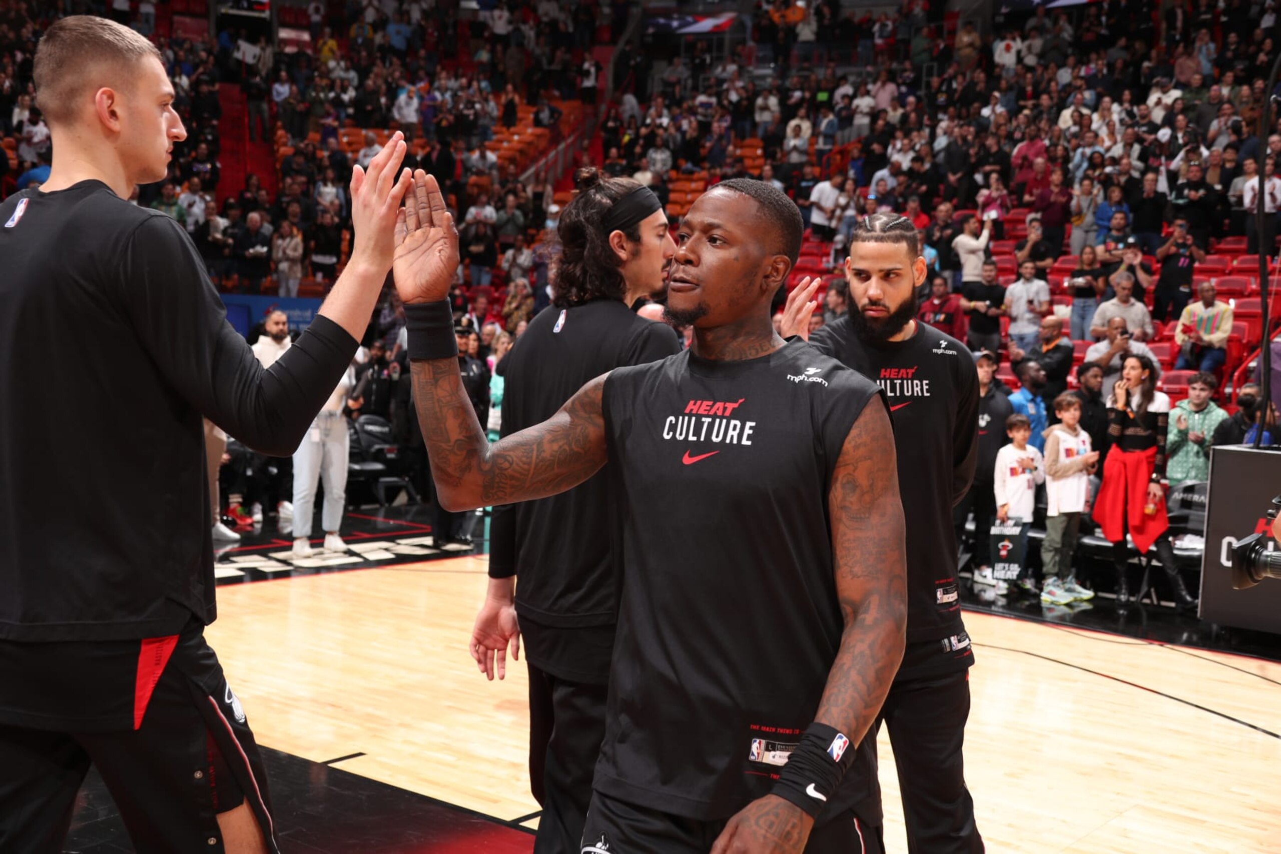 MIAMI, FL - JANUARY 29: Terry Rozier III #2 of the Miami Heat high fives before the game against the Phoenix Suns on January 29, 2024 at Kaseya Center in Miami, Florida. NOTE TO USER: User expressly acknowledges and agrees that, by downloading and or using this Photograph, user is consenting to the terms and conditions of the Getty Images License Agreement. Mandatory Copyright Notice: Copyright 2024 NBAE (Photo by Issac Baldizon/NBAE via Getty Images)