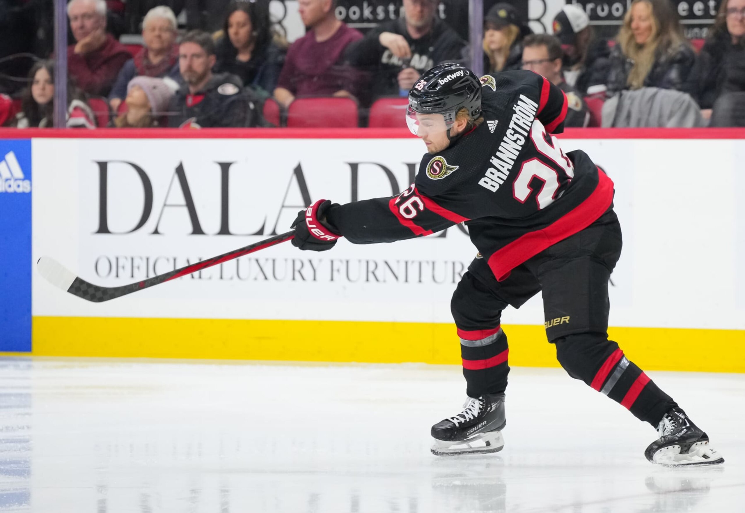 OTTAWA, CANADA - JANUARY 20: Erik Brannstrom #26 of the Ottawa Senators skates against the Winnipeg Jets at Canadian Tire Centre on January 20, 2024 in Ottawa, Ontario, Canada. (Photo by Chris Tanouye/Freestyle Photography/Getty Images)