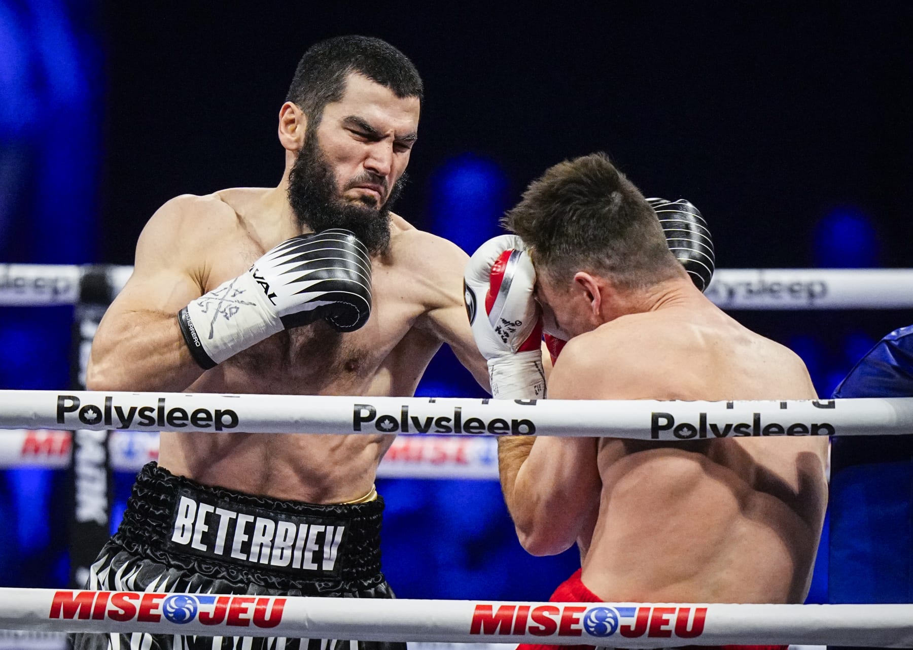 QUEBEC CITY, CANADA - JANUARY 13: Artur Beterbiev of Canada punches Callum Smith of the United Kingdom during their  WBC, IBF and WBO light-heavyweight world championship fight at Videotron Centre on January 13, 2024 in Quebec City, Canada. (Photo by Mathieu Belanger/Getty Images)