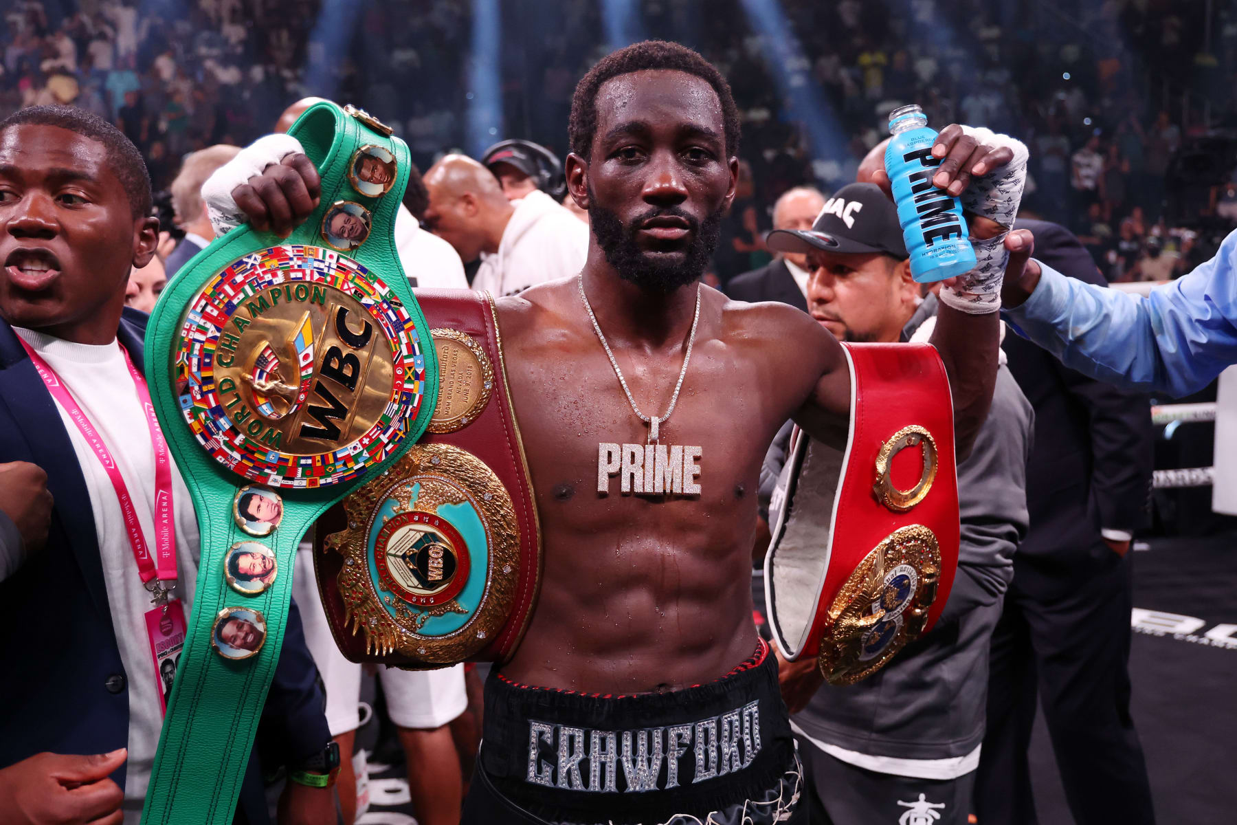 LAS VEGAS, NEVADA - JULY 29: Terence Crawford celebrates with the championship belt after defeating Errol Spence Jr. in the World Welterweight Championship bout at T-Mobile Arena on July 29, 2023 in Las Vegas, Nevada. (Photo by Al Bello/Getty Images)