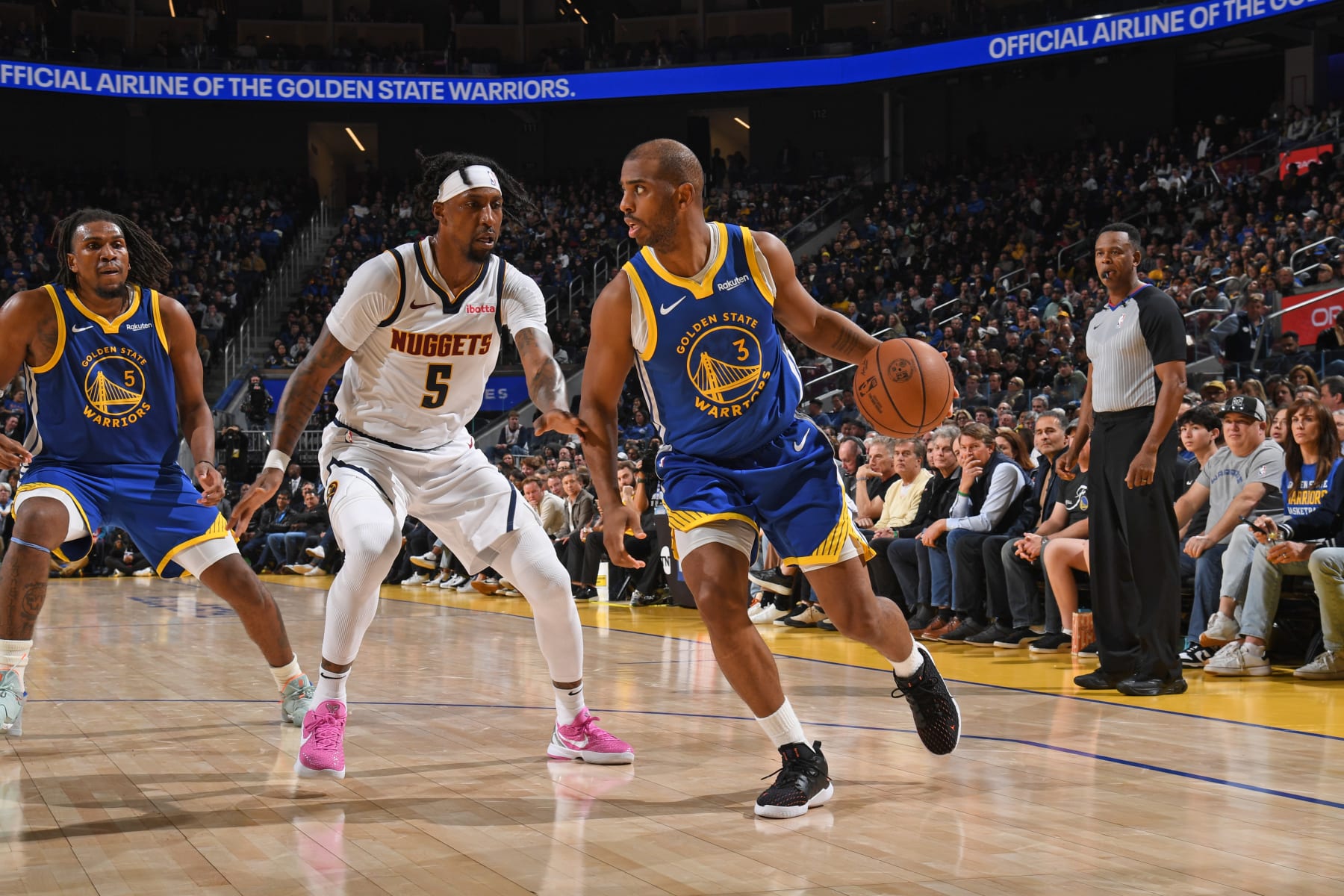 SAN FRANCISCO, CA - JANUARY 4: Chris Paul #3 of the Golden State Warriors dribbles the ball during the game against the Denver Nuggets on January 4, 2024 at Chase Center in San Francisco, California. NOTE TO USER: User expressly acknowledges and agrees that, by downloading and or using this photograph, user is consenting to the terms and conditions of Getty Images License Agreement. Mandatory Copyright Notice: Copyright 2024 NBAE (Photo by Noah Graham/NBAE via Getty Images)