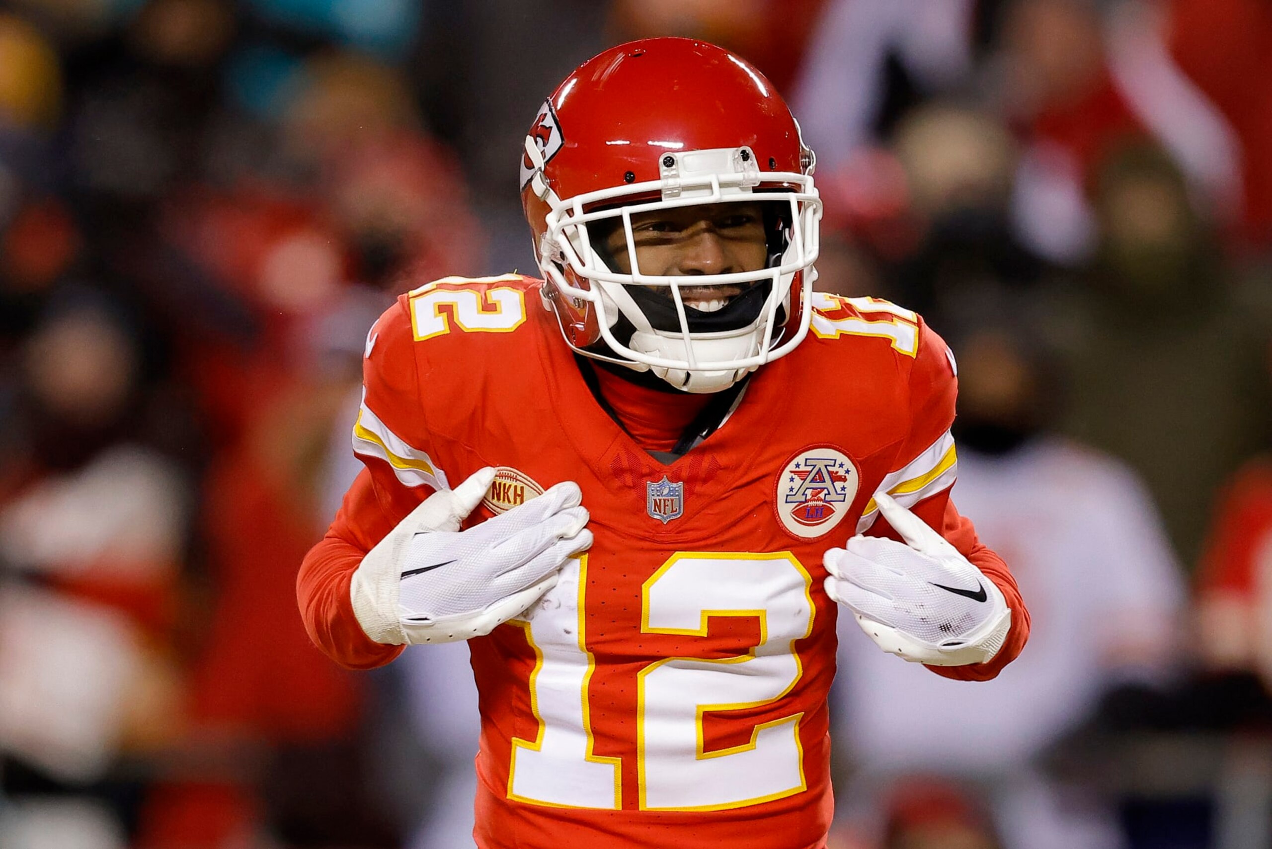 KANSAS CITY, MISSOURI - JANUARY 13: Mecole Hardman Jr. #12 of the Kansas City Chiefs reacts after a no-call during the second quarter in the AFC Wild Card Playoffs against the Miami Dolphins at GEHA Field at Arrowhead Stadium on January 13, 2024 in Kansas City, Missouri. (Photo by David Eulitt/Getty Images)