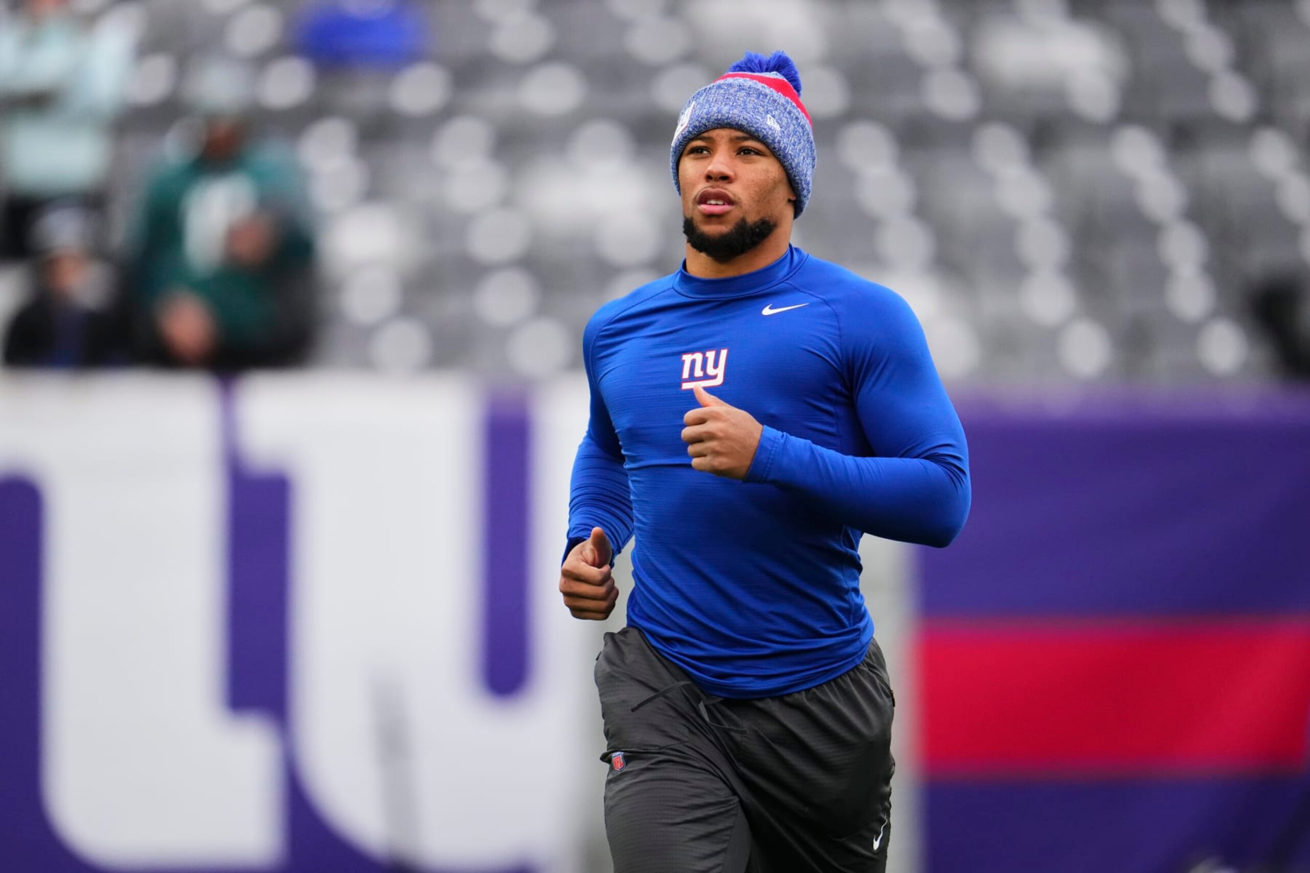 EAST RUTHERFORD, NJ - JANUARY 07: Saquon Barkley #26 of the New York Giants warms up before kickoff against the Philadelphia Eagles at MetLife Stadium on January 7, 2024 in East Rutherford, New Jersey. (Photo by Cooper Neill/Getty Images) EAST RUTHERFORD, NJ - JANUARY 07: Saquon Barkley #26 of the New York Giants warms up before kickoff against the Philadelphia Eagles at MetLife Stadium on January 7, 2024 in East Rutherford, New Jersey. (Photo by Cooper Neill/Getty Images)