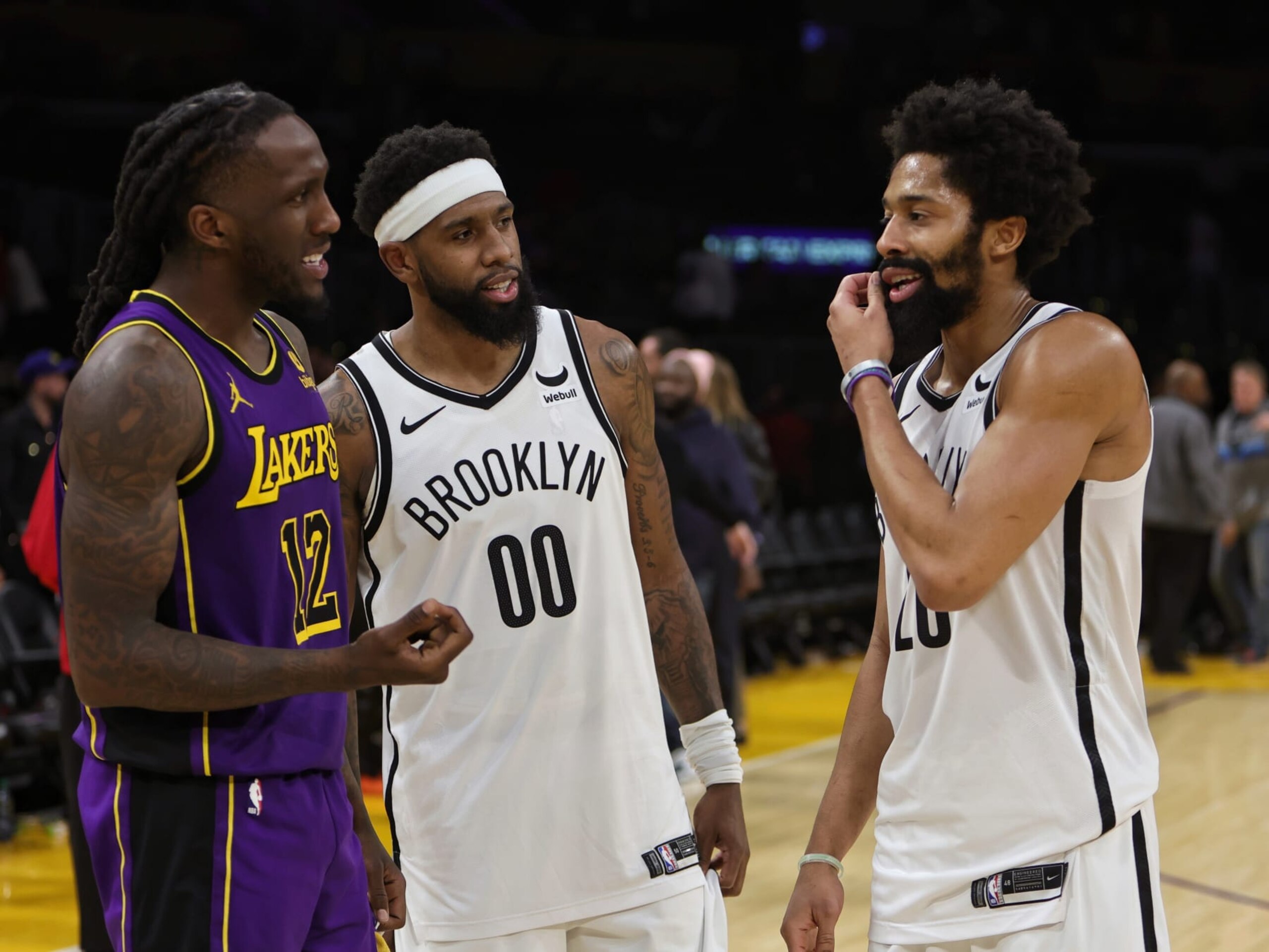 LOS ANGELES, CA - JANUARY 19: Taurean Prince #12 of the Los Angeles Lakers talks to Royce O'Neale #00 and Spencer Dinwiddie #26 of the Brooklyn Nets after the game on January 19, 2024 at Crypto.Com Arena in Los Angeles, California. NOTE TO USER: User expressly acknowledges and agrees that, by downloading and/or using this Photograph, user is consenting to the terms and conditions of the Getty Images License Agreement. Mandatory Copyright Notice: Copyright 2024 NBAE (Photo by Jim Poorten/NBAE via Getty Images)