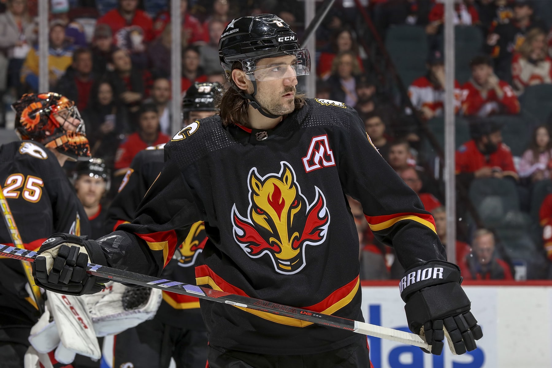 CALGARY, AB - JANUARY 23: Christopher Tanev #8 of the Calgary Flames skates between whistles against the St Louis Blues at Scotiabank Saddledome on January 23, 2024 in Calgary, Alberta, Canada. (Photo by Gerry Thomas/NHLI via Getty Images)