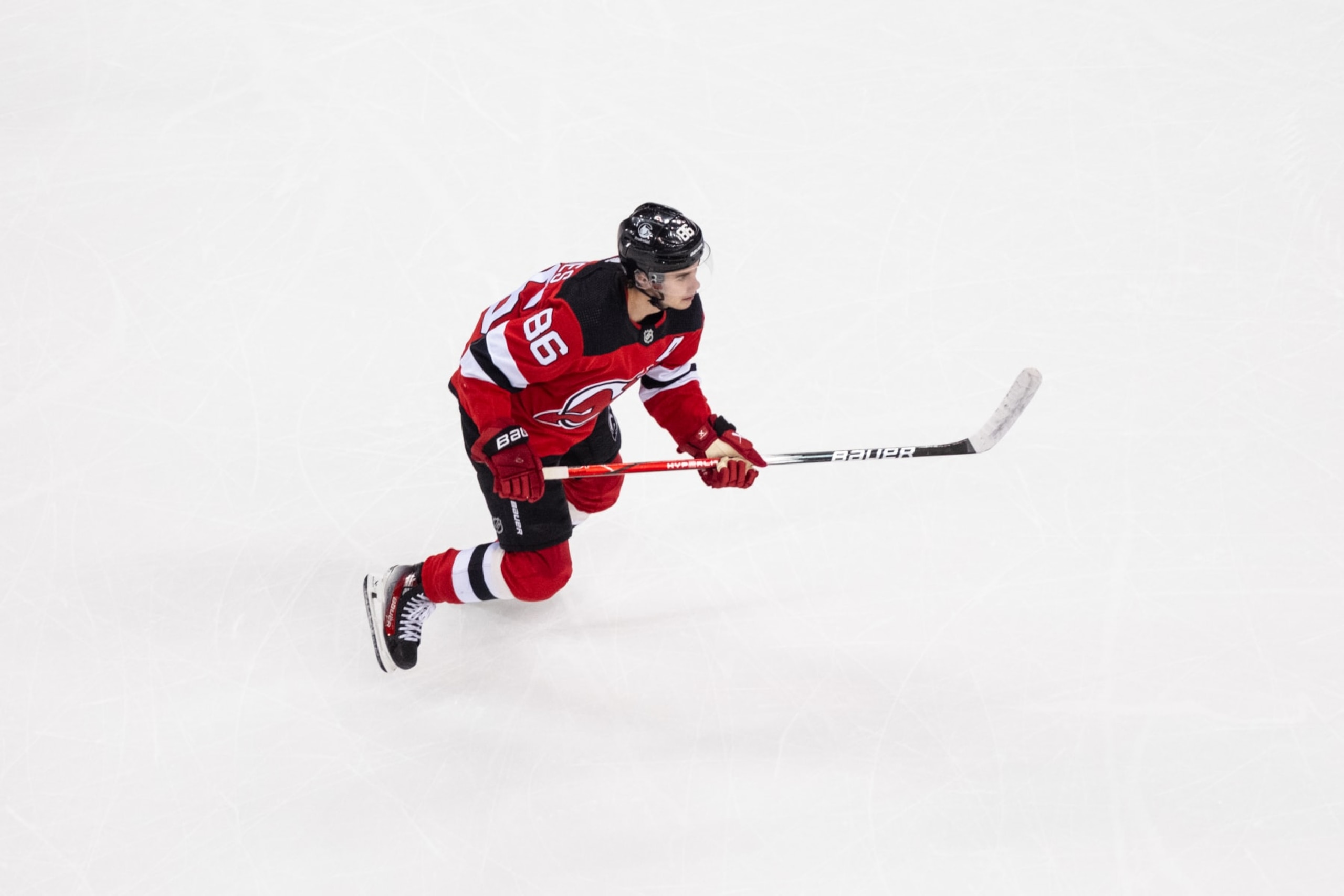 NEWARK, NEW JERSEY - JANUARY 05: Jack Hughes #86 of the New Jersey Devils skates during the first period of a game against the Chicago Blackhawks at Prudential Center on January 05, 2024 in Newark, New Jersey. (Photo by Michael Mooney/NHLI via Getty Images)