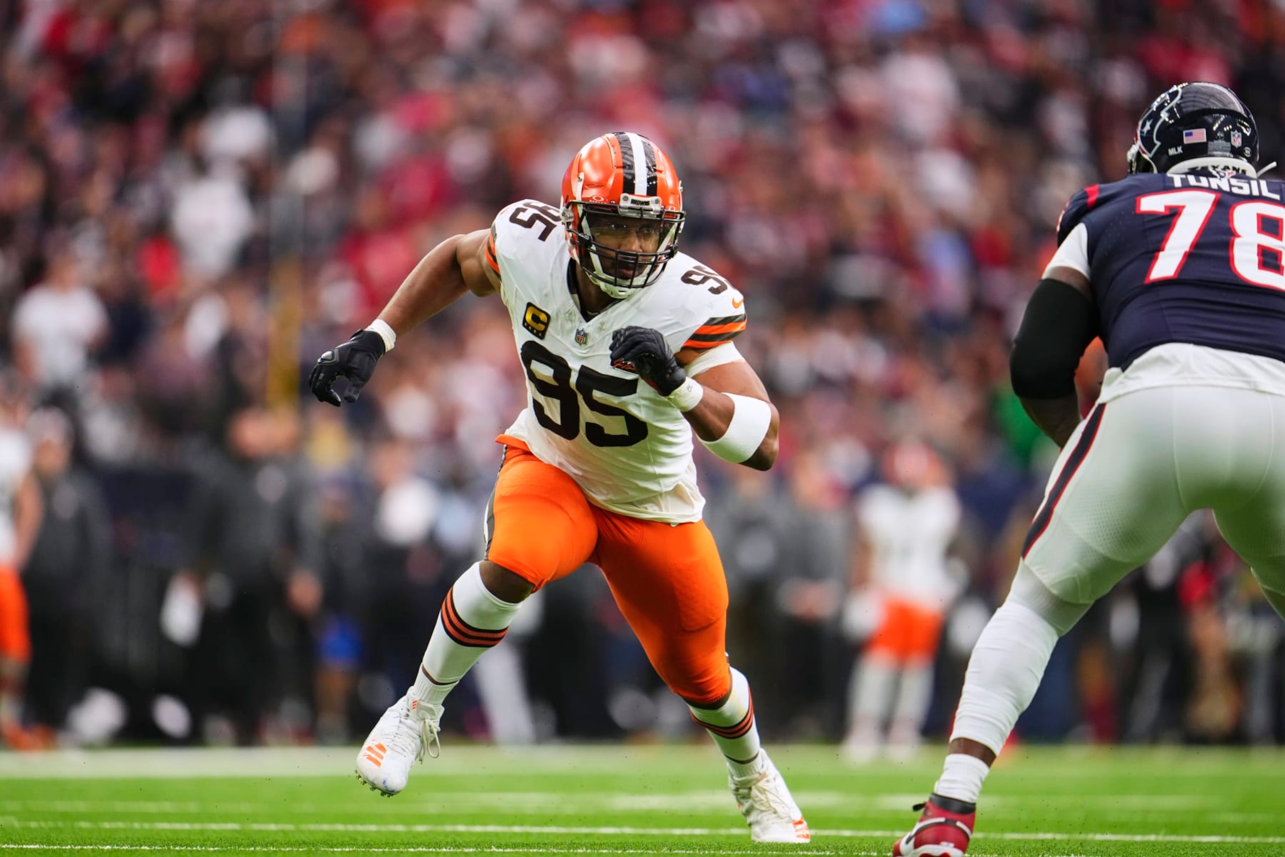 HOUSTON, TX - JANUARY 13: Myles Garrett #95 of the Cleveland Browns defends against the Houston Texans during the first half of the AFC Wild Card playoff game at NRG Stadium on January 13, 2024 in Houston, Texas. (Photo by Cooper Neill/Getty Images)