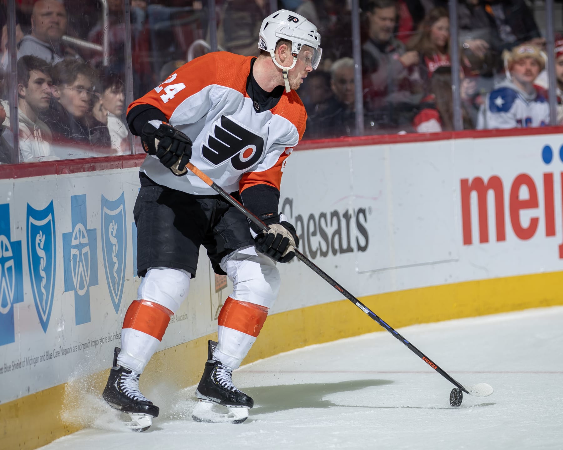 DETROIT, MI - JANUARY 25: Nick Seeler #24 of the Philadelphia Flyers controls the puck behind the net against the Detroit Red Wings during the second period at Little Caesars Arena on January 25, 2024 in Detroit, Michigan. Detroit defeated Philadelphia 3-0. (Photo by Dave Reginek/NHLI via Getty Images)