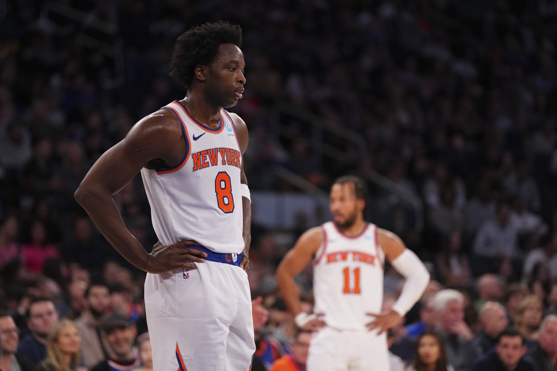 NEW YORK, NEW YORK - JANUARY 1: OG Anunoby #8 and Jalen Brunson #11 of the New York Knicks look on against the Minnesota Timberwolves at Madison Square Garden on January 1, 2024 in New York City. The Knicks defeated the Timberwolves 112-106. NOTE TO USER: User expressly acknowledges and agrees that, by downloading and or using this photograph, User is consenting to the terms and conditions of the Getty Images License Agreement. (Photo by Mitchell Leff/Getty Images)
