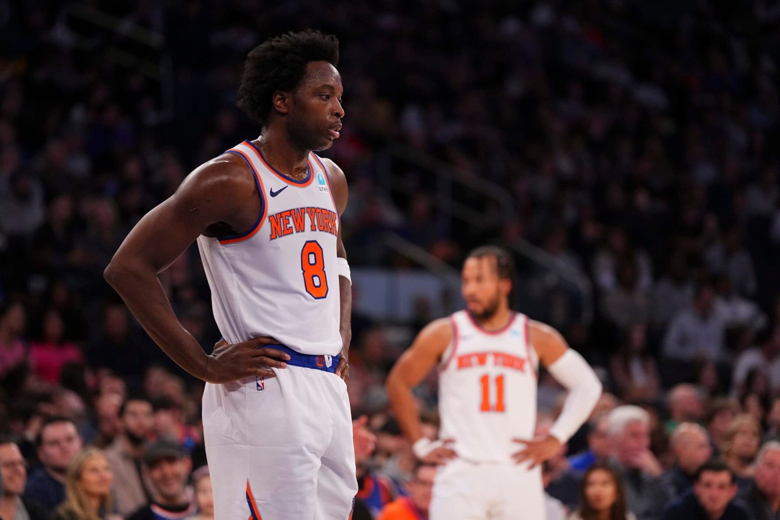 NEW YORK, NEW YORK - JANUARY 1: OG Anunoby #8 and Jalen Brunson #11 of the New York Knicks look on against the Minnesota Timberwolves at Madison Square Garden on January 1, 2024 in New York City. The Knicks defeated the Timberwolves 112-106. NOTE TO USER: User expressly acknowledges and agrees that, by downloading and or using this photograph, User is consenting to the terms and conditions of the Getty Images License Agreement. (Photo by Mitchell Leff/Getty Images)