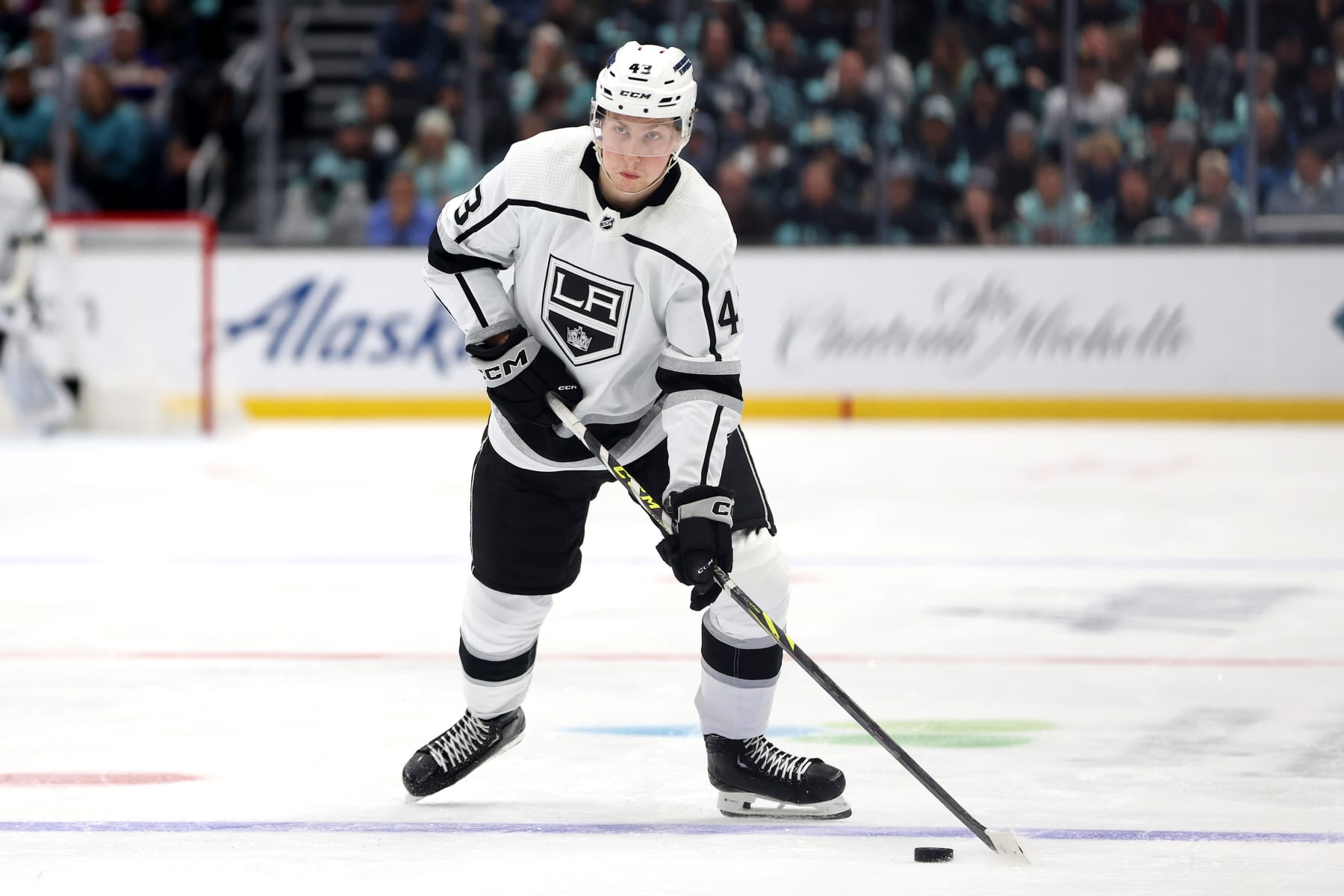 SEATTLE, WASHINGTON - DECEMBER 16: Arthur Kaliyev #34 of the Los Angeles Kings skates against the Seattle Kraken during the third period at Climate Pledge Arena on December 16, 2023 in Seattle, Washington. (Photo by Steph Chambers/Getty Images)