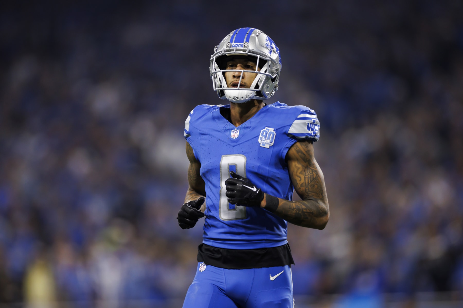 DETROIT, MICHIGAN - JANUARY 14: Josh Reynolds #8 of the Detroit Lions lines up to run a route during an NFC Wild Card Playoff football game against the Los Angeles Rams at Ford Field on January 14, 2024 in Detroit, Michigan. (Photo by Ryan Kang/Getty Images)