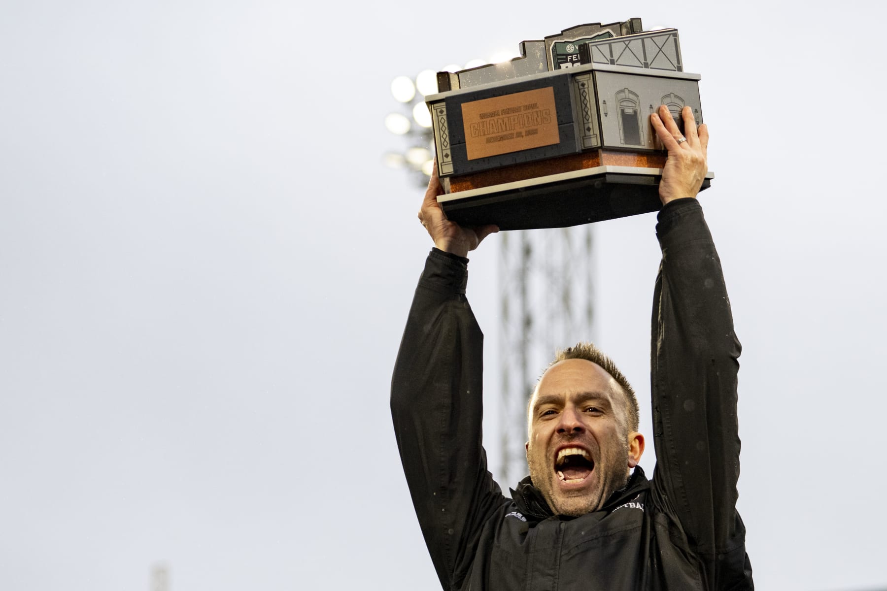 BOSTON, MA - DECEMBER 28: Head coach Jeff Hafley of the Boston College Eagles reacts as he lifts the trophy after a victory during the 2023 Wasabi Fenway Bowl against the Southern Methodist University Mustangs on December 28, 2023 at Fenway Park in Boston, Massachusetts. (Photo by Billie Weiss/Boston Red Sox/Getty Images)