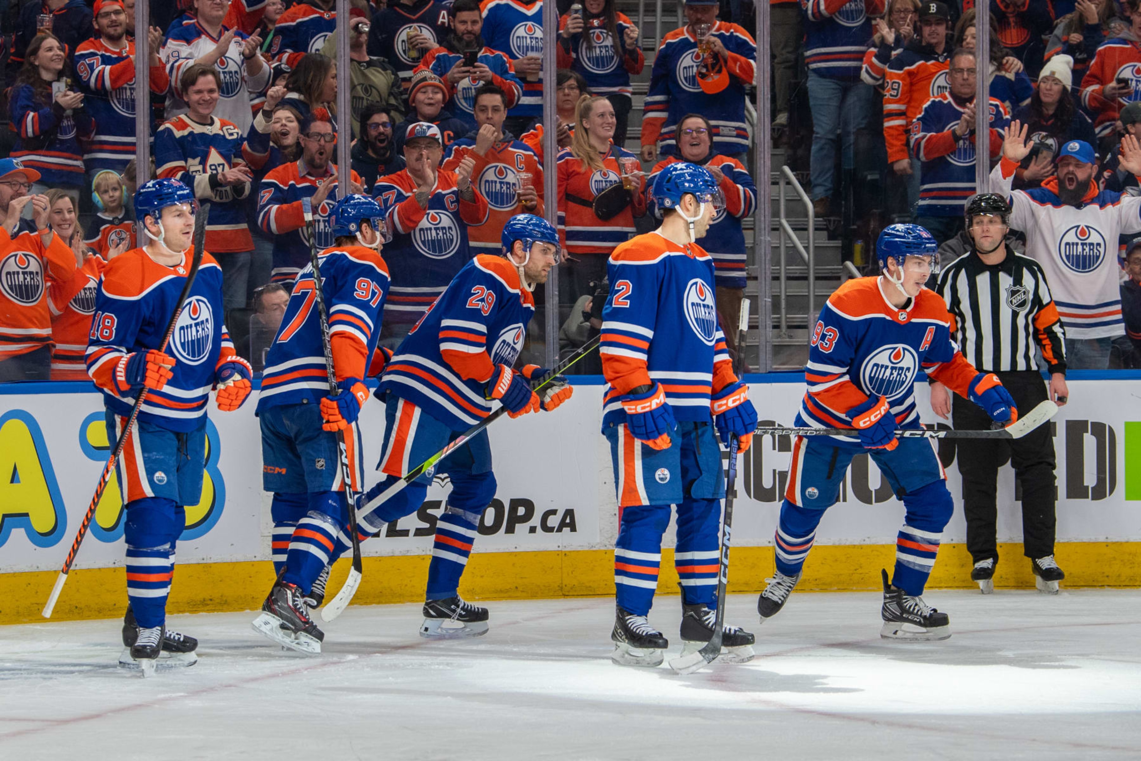EDMONTON, CANADA - JANUARY 27: Ryan Nugent-Hopkins #93 of the Edmonton Oilers celebrates after his first period goal against the Nashville Predators with teammates Connor McDavid #97, Zach Hyman #18, Evan Bouchard #2 and Leon Draisaitl #29 at Rogers Place on January 27, 2024, in Edmonton, Alberta, Canada. (Photo by Andy Devlin/NHLI via Getty Images)