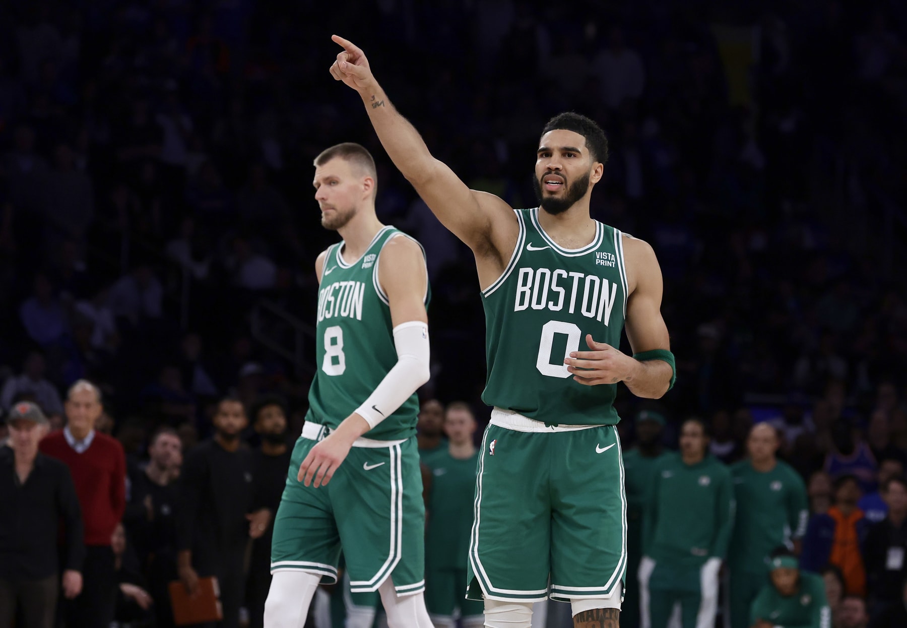 NEW YORK, NEW YORK - OCTOBER 25: (NEW YORK DAILIES OUT)  Jayson Tatum #0 and Kristaps Porzingis #8 of the Boston Celtics in action against the New York Knicks at Madison Square Garden on October 25, 2023 in New York City. The Celtics defeated the Knicks 108-104. NOTE TO USER: User expressly acknowledges and agrees that, by downloading and or using this photograph, User is consenting to the terms and conditions of the Getty Images License Agreement. (Photo by Jim McIsaac/Getty Images)