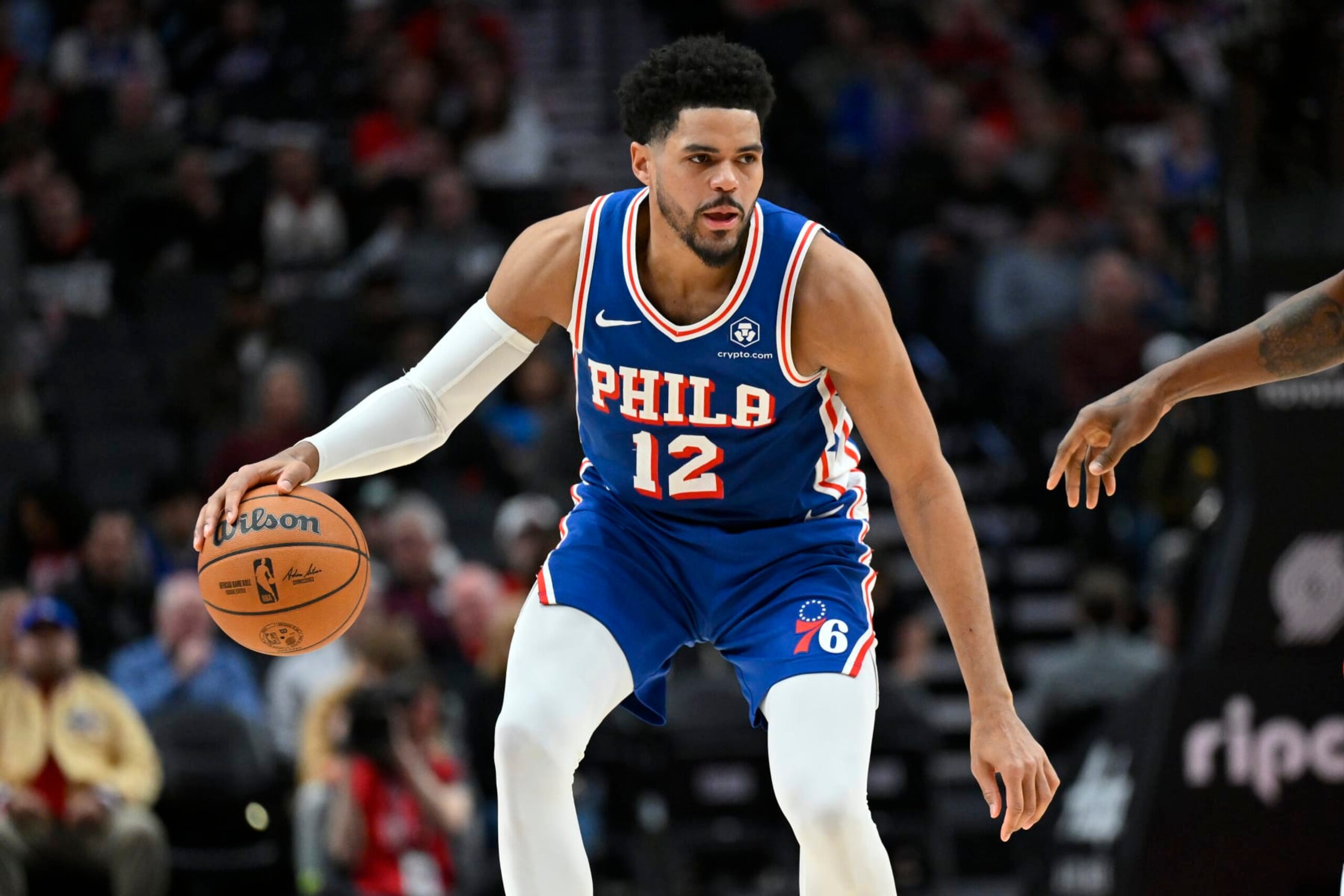PORTLAND, OREGON - JANUARY 29: Tobias Harris #12 of the Philadelphia 76ers dribbles during the third quarter against the Portland Trail Blazers at the Moda Center on January 29, 2024 in Portland, Oregon. The Portland Trail Blazers won 130-104. NOTE TO USER: User expressly acknowledges and agrees that, by downloading and or using this photograph, User is consenting to the terms and conditions of the Getty Images License Agreement. (Photo by Alika Jenner/Getty Images)