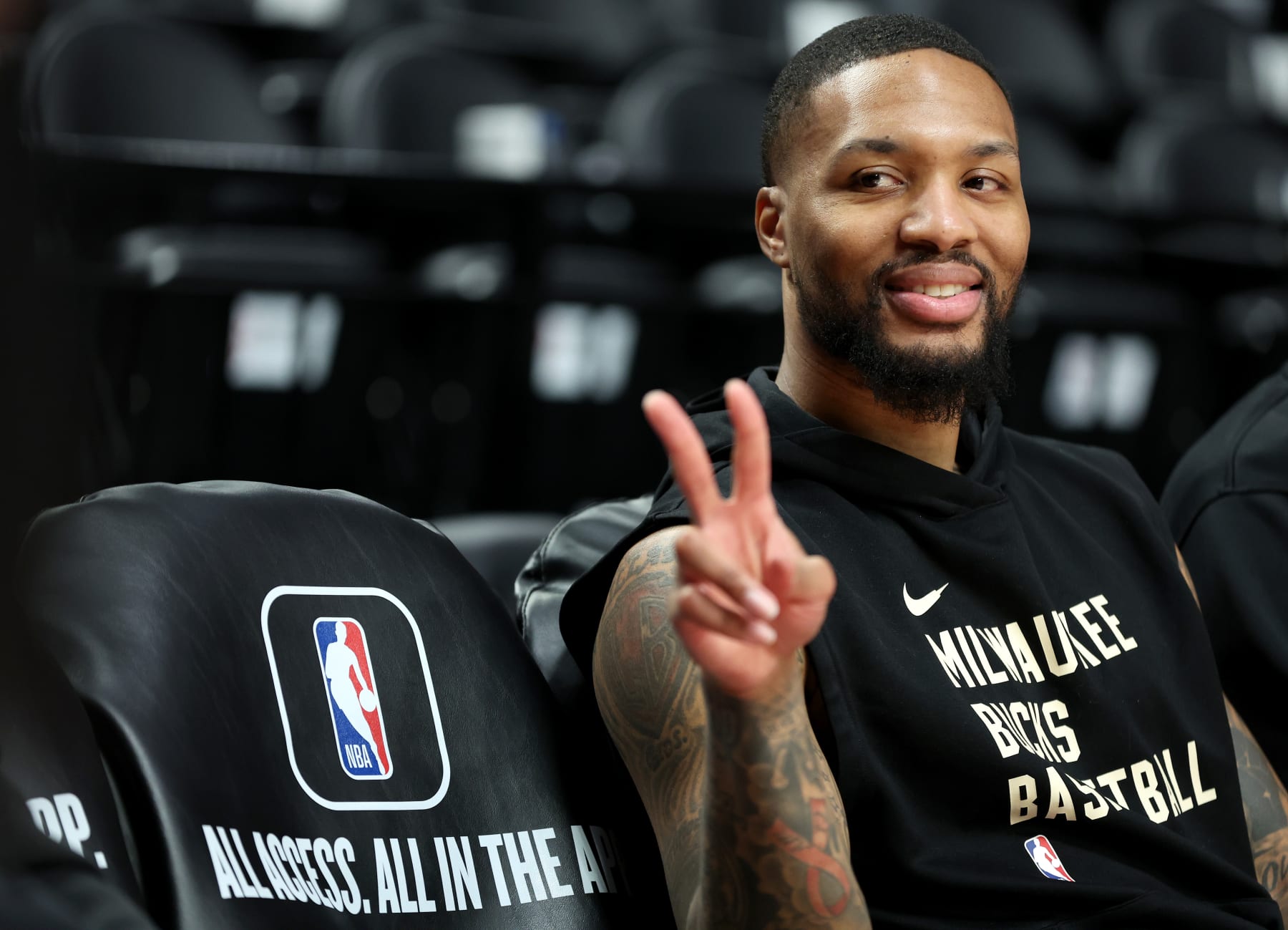 PORTLAND, OREGON - JANUARY 31: Damian Lillard #0 of the Milwaukee Bucks reacts toward fans before his return against the Portland Trail Blazers at Moda Center on January 31, 2024 in Portland, Oregon. (Photo by Steph Chambers/Getty Images)
