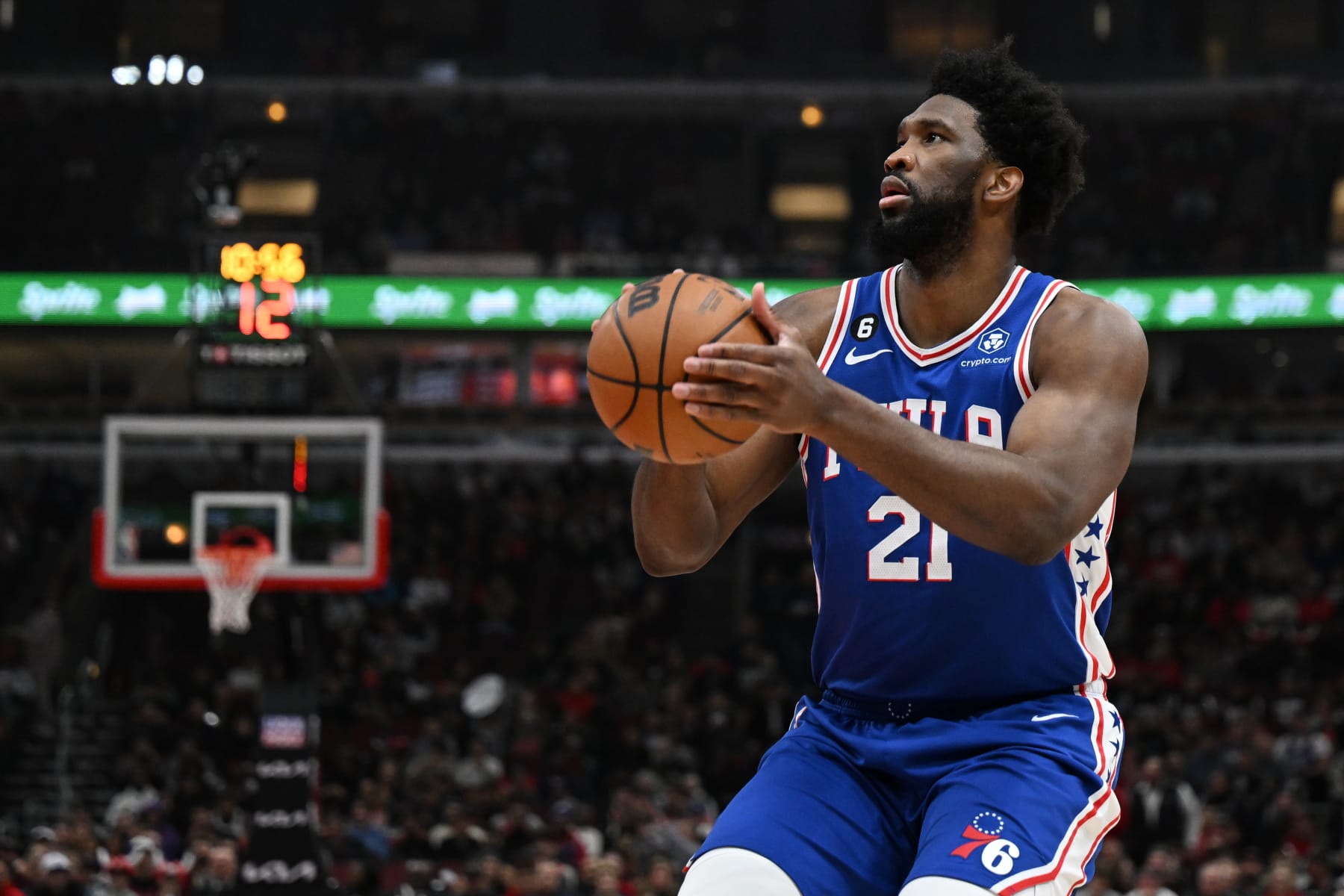 CHICAGO, ILLINOIS - MARCH 22: Joel Embiid #21 of the Philadelphia 76ers shoots in the first half against the Chicago Bulls at United Center on March 22, 2023 in Chicago, Illinois.  NOTE TO USER: User expressly acknowledges and agrees that, by downloading and or using this photograph, User is consenting to the terms and conditions of the Getty Images License Agreement.  (Photo by Quinn Harris/Getty Images)