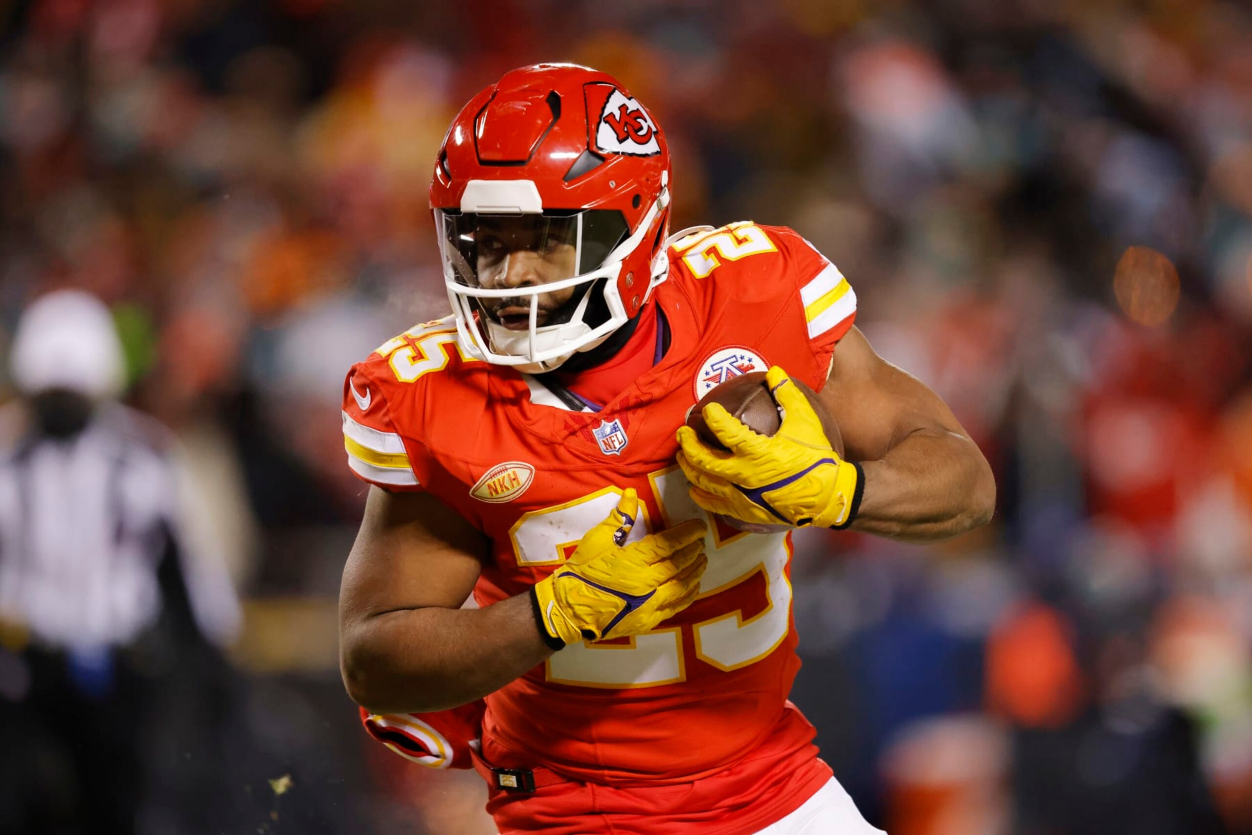 KANSAS CITY, MISSOURI - JANUARY 13: Clyde Edwards-Helaire #25 of the Kansas City Chiefs runs with the ball during the second half against the Miami Dolphins in the AFC Wild Card Playoffs at GEHA Field at Arrowhead Stadium on January 13, 2024 in Kansas City, Missouri. (Photo by David Eulitt/Getty Images)