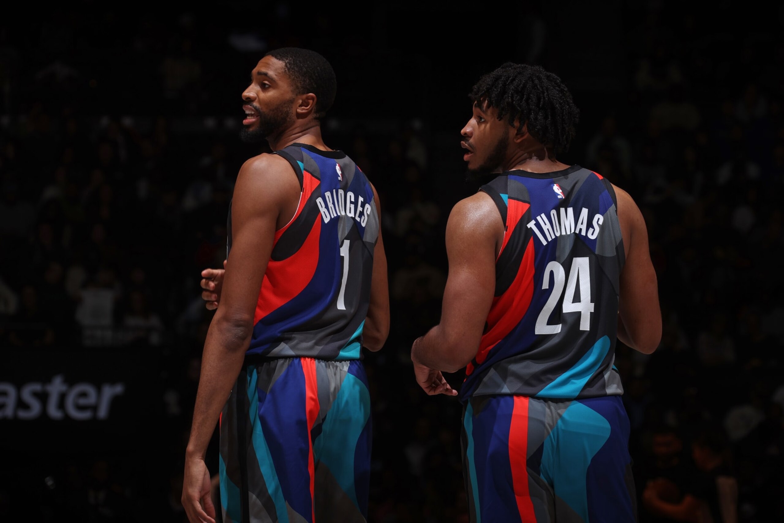 BROOKLYN, NY - DECEMBER 2: Mikal Bridges #1 and Cam Thomas #24 of the Brooklyn Nets look on during the game against the Orlando Magic on December 2, 2023 at Barclays Center in Brooklyn, New York. NOTE TO USER: User expressly acknowledges and agrees that, by downloading and or using this Photograph, user is consenting to the terms and conditions of the Getty Images License Agreement. Mandatory Copyright Notice: Copyright 2023 NBAE (Photo by Nathaniel S. Butler/NBAE via Getty Images)