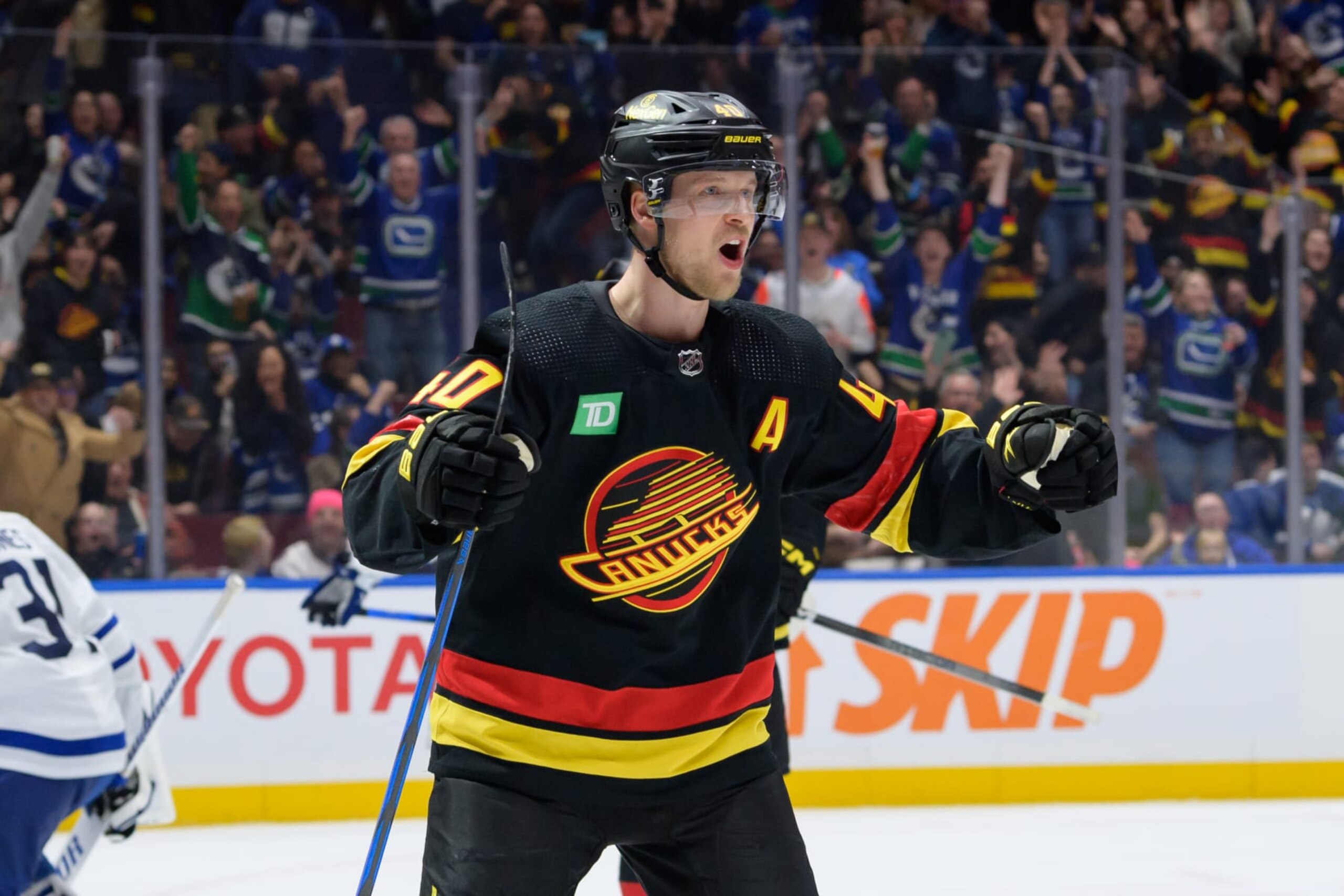 VANCOUVER, CANADA - JANUARY 20: Elias Pettersson #40 of the Vancouver Canucks celebrates after scoring a goal against the Toronto Maple Leafs during the third period of their NHL game at Rogers Arena on January 20, 2024 in Vancouver, British Columbia, Canada. (Photo by Derek Cain/Getty Images)