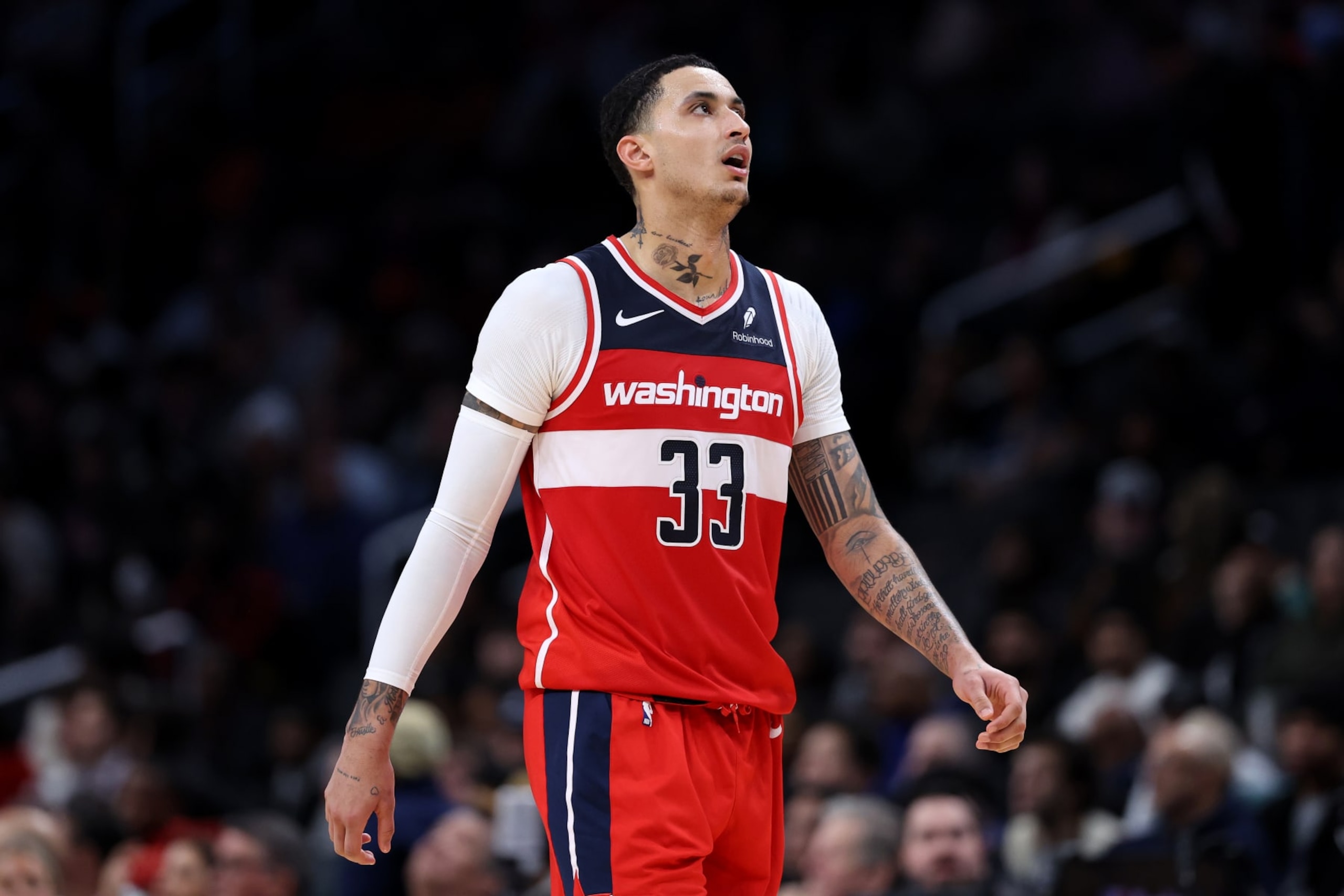 WASHINGTON, DC - JANUARY 31: Kyle Kuzma #33 of the Washington Wizards reacts against the LA Clippers during first half at Capital One Arena on January 31, 2024 in Washington, DC. NOTE TO USER: User expressly acknowledges and agrees that, by downloading and or using this photograph, User is consenting to the terms and conditions of the Getty Images License Agreement.  (Photo by Patrick Smith/Getty Images)