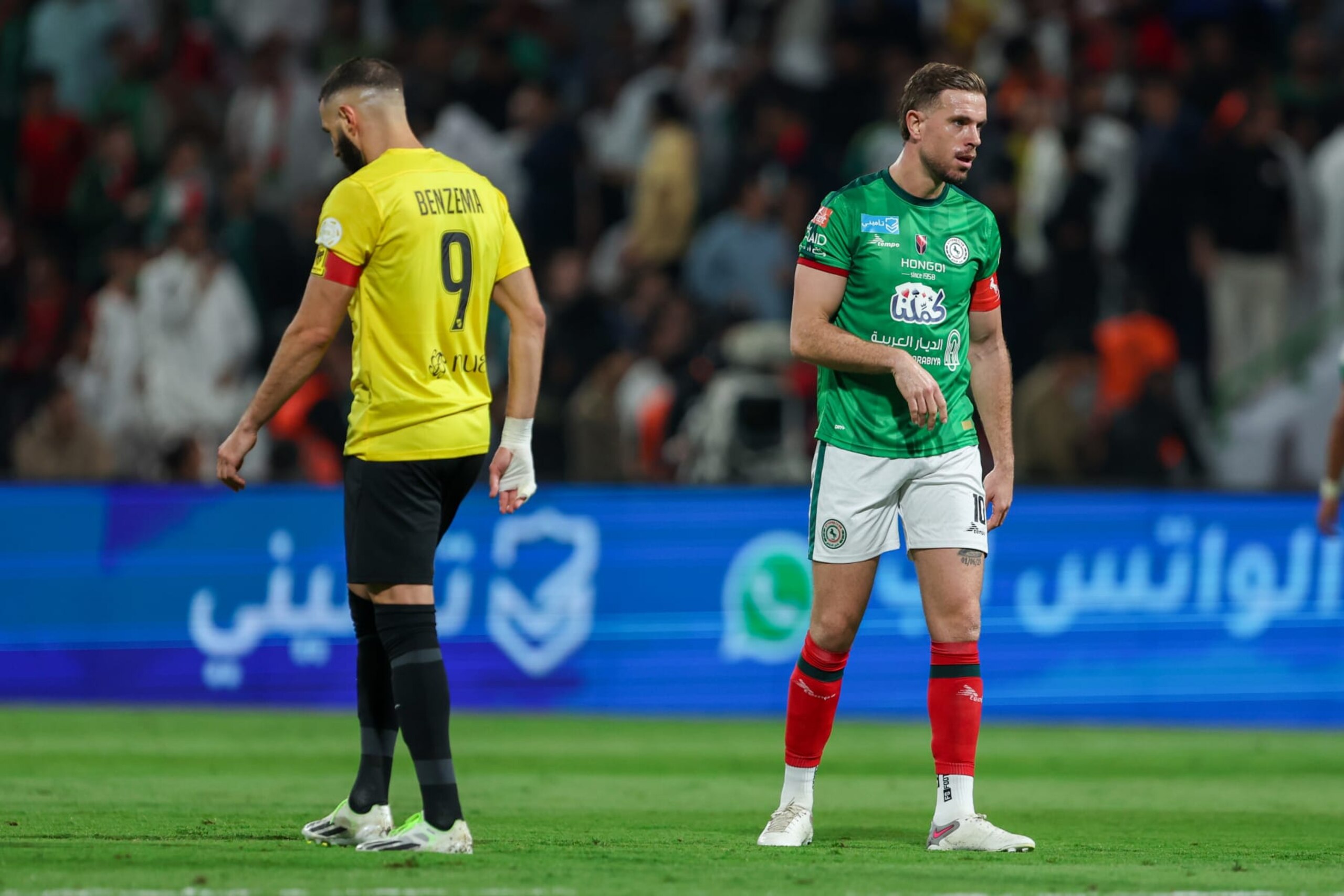 AL DAMMAM, SAUDI ARABIA - NOVEMBER 24: Jordan Henderson of Al Ettifaq and Karim Benzema of Al Ittihad during the Saudi Pro League match between Al-Ettifaq and Al-Ittihad at Al Ettifaq Stadium on November 24, 2023 in Al Dammam, Saudi Arabia. (Photo by Yasser Bakhsh/Getty Images)