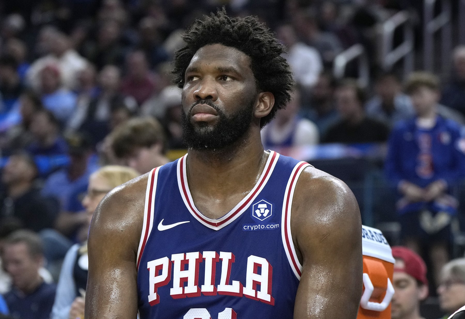 SAN FRANCISCO, CALIFORNIA - JANUARY 30: Joel Embiid #21 of the Philadelphia 76ers looks on from the bench against the Golden State Warriors during the fourth quarter of an NBA basketball game at Chase Center on January 30, 2024 in San Francisco, California. NOTE TO USER: User expressly acknowledges and agrees that, by downloading and or using this photograph, User is consenting to the terms and conditions of the Getty Images License Agreement. (Photo by Thearon W. Henderson/Getty Images)