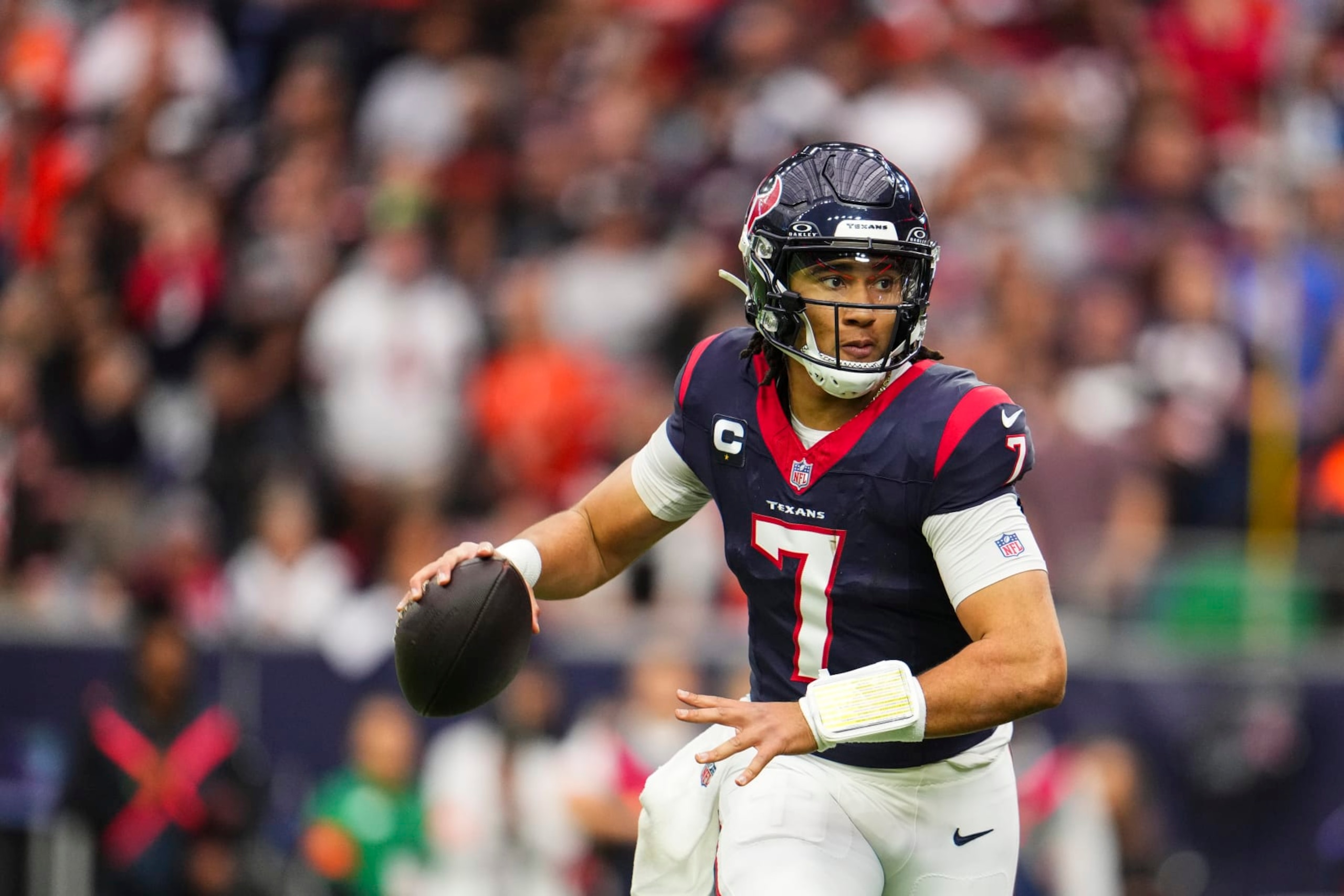 HOUSTON, TX - JANUARY 13: C.J. Stroud #7 of the Houston Texans throws the ball during an NFL wild-card playoff football game against the Cleveland Browns at NRG Stadium on January 13, 2024 in Houston, Texas. (Photo by Cooper Neill/Getty Images) HOUSTON, TX - JANUARY 13: C.J. Stroud #7 of the Houston Texans throws the ball during an NFL wild-card playoff football game against the Cleveland Browns at NRG Stadium on January 13, 2024 in Houston, Texas. (Photo by Cooper Neill/Getty Images)