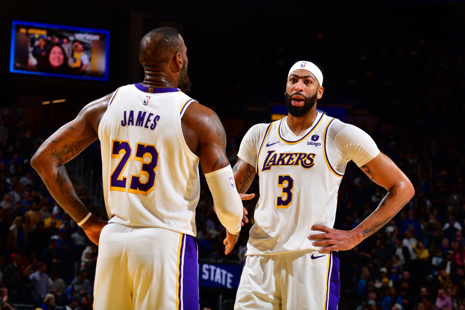 SAN FRANCISCO, CA - JANUARY 27:  LeBron James #23  and Anthony Davis #3 of the Los Angeles Lakers talk during the game against the Golden State Warriors on January 27, 2024 at Chase Center in San Francisco, California. NOTE TO USER: User expressly acknowledges and agrees that, by downloading and or using this photograph, user is consenting to the terms and conditions of Getty Images License Agreement. Mandatory Copyright Notice: Copyright 2024 NBAE (Photo by Barry Gossage/NBAE via Getty Images)