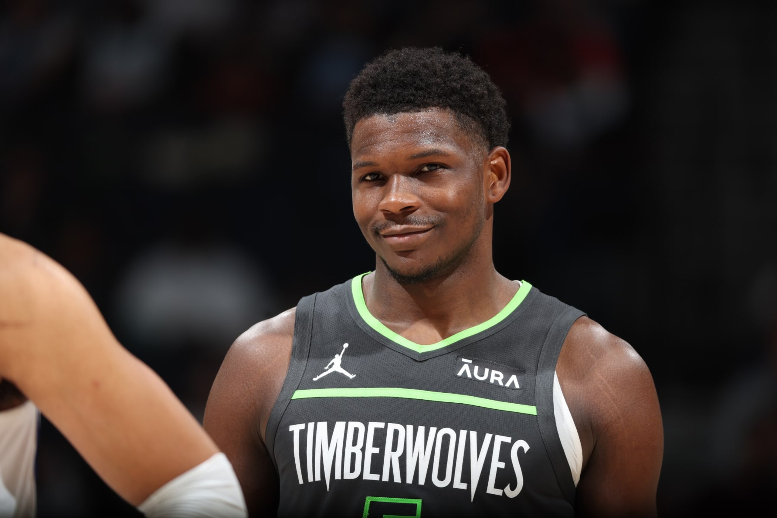 MINNEAPOLIS, MN -  JANUARY 31: Anthony Edwards #5 of the Minnesota Timberwolves smiles during the game against the Dallas Mavericks on January 31, 2024 at Target Center in Minneapolis, Minnesota. NOTE TO USER: User expressly acknowledges and agrees that, by downloading and or using this Photograph, user is consenting to the terms and conditions of the Getty Images License Agreement. Mandatory Copyright Notice: Copyright 2024 NBAE (Photo by David Sherman/NBAE via Getty Images)