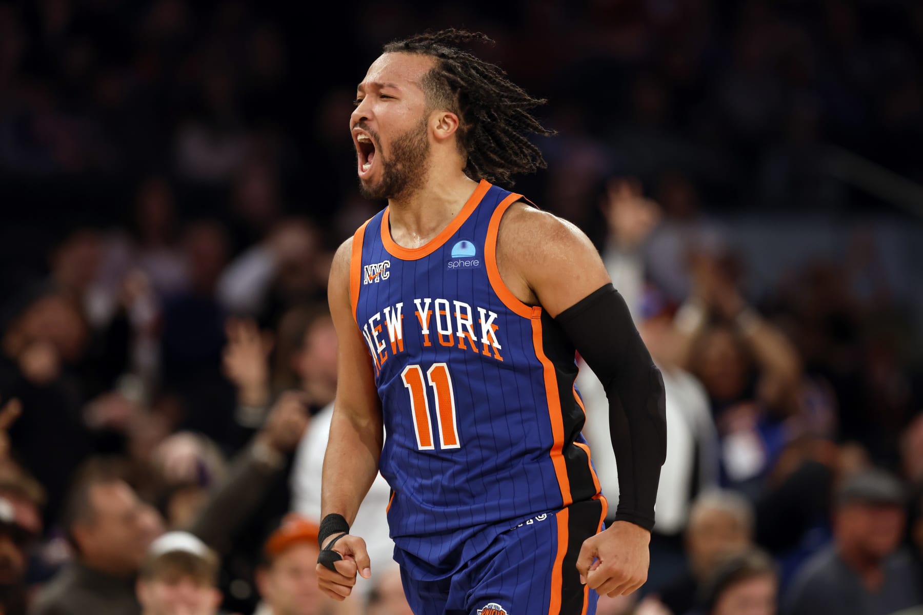 NEW YORK, NEW YORK - JANUARY 20: Jalen Brunson #11 of the New York Knicks reacts after making a three-point shot during the second half against the Toronto Raptors at Madison Square Garden on January 20, 2024 in New York City. The Knicks won 126-120. NOTE TO USER: User expressly acknowledges and agrees that, by downloading and/or using this Photograph, user is consenting to the terms and conditions of the Getty Images License Agreement. (Photo by Sarah Stier/Getty Images)