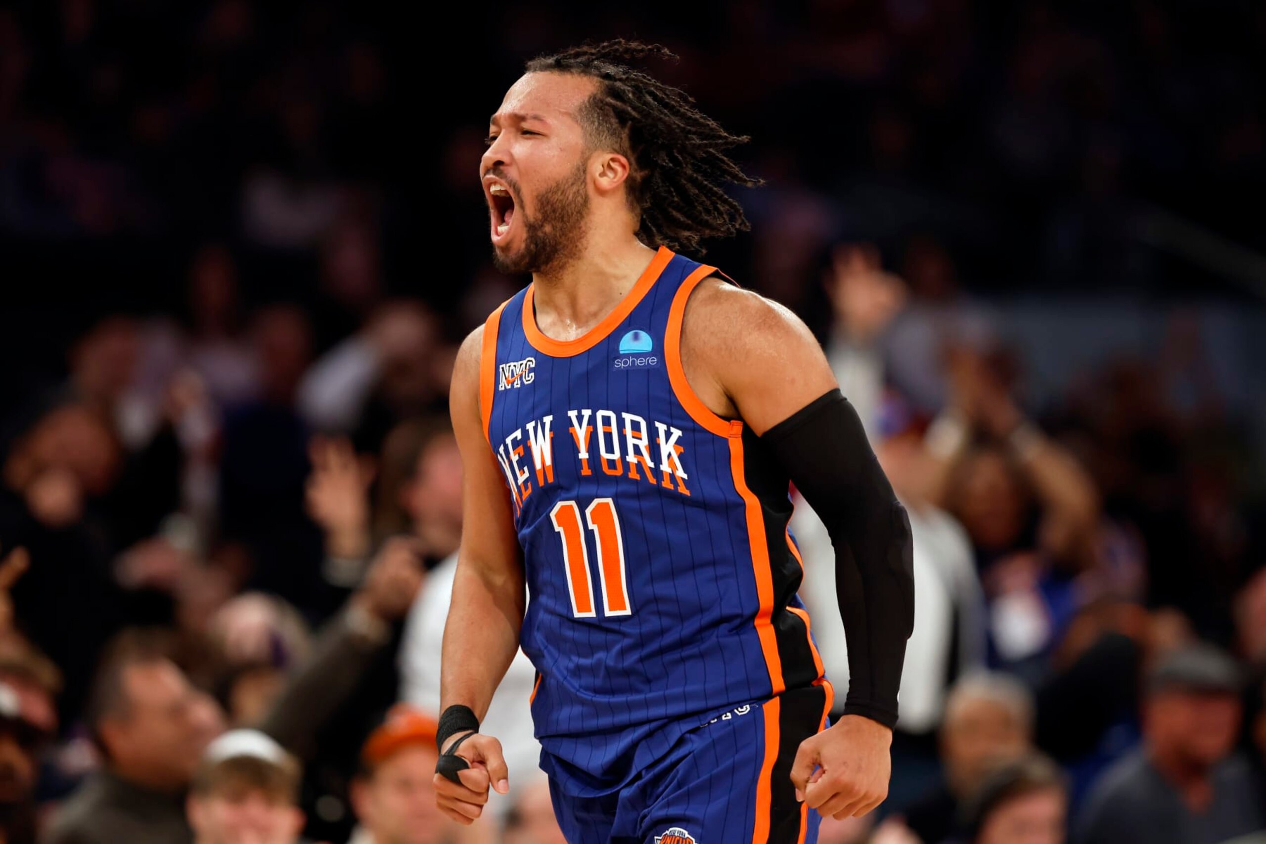 NEW YORK, NEW YORK - JANUARY 20: Jalen Brunson #11 of the New York Knicks reacts after making a three-point shot during the second half against the Toronto Raptors at Madison Square Garden on January 20, 2024 in New York City. The Knicks won 126-120. NOTE TO USER: User expressly acknowledges and agrees that, by downloading and/or using this Photograph, user is consenting to the terms and conditions of the Getty Images License Agreement. (Photo by Sarah Stier/Getty Images)