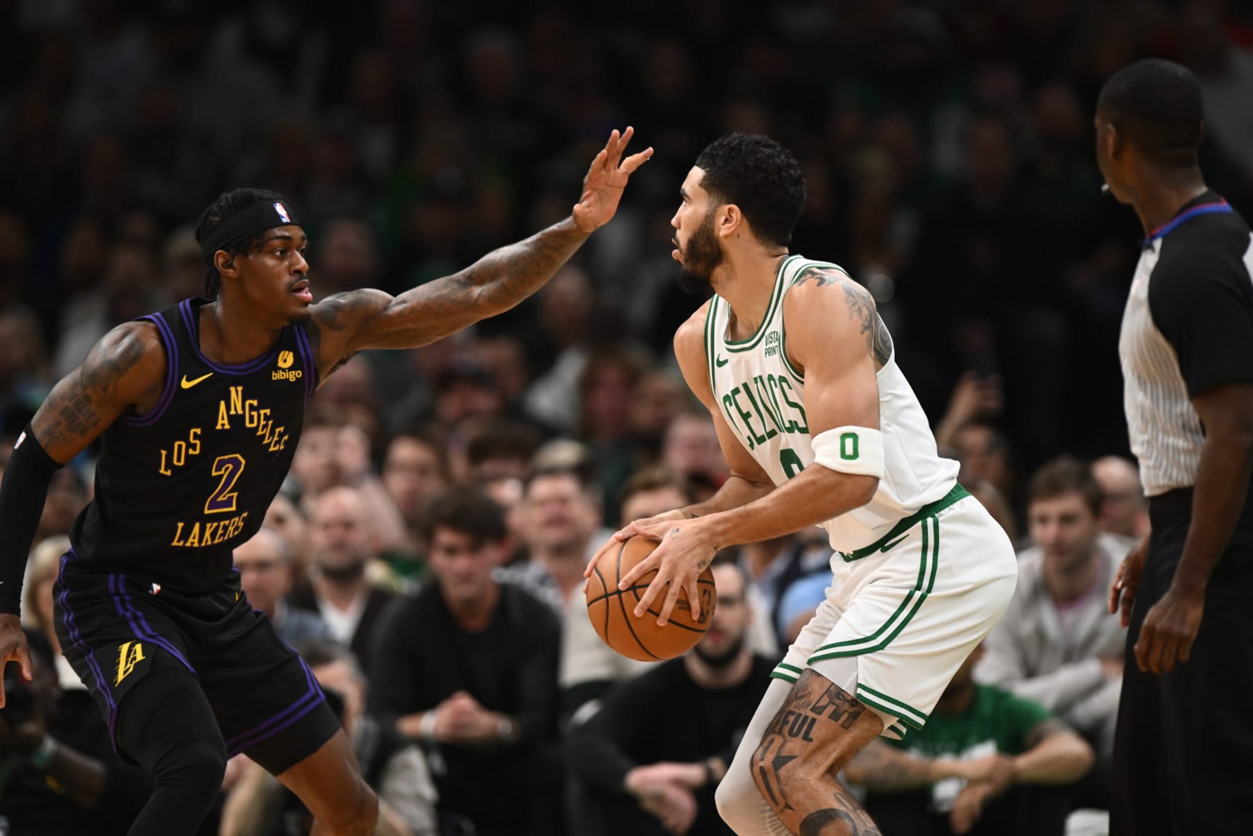 BOSTON, MASSACHUSETTS - FEBRUARY 01: Jarred Vanderbilt #2 of the Los Angeles Lakers defends Jayson Tatum #0 of the Boston Celtics during the first quarter at the TD Garden on February 01, 2024 in Boston, Massachusetts. NOTE TO USER: User expressly acknowledges and agrees that, by downloading and or using this photograph, User is consenting to the terms and conditions of the Getty Images License Agreement. (Photo by Brian Fluharty/Getty Images) BOSTON, MASSACHUSETTS - FEBRUARY 01: Jarred Vanderbilt #2 of the Los Angeles Lakers defends Jayson Tatum #0 of the Boston Celtics during the first quarter at the TD Garden on February 01, 2024 in Boston, Massachusetts. NOTE TO USER: User expressly acknowledges and agrees that, by downloading and or using this photograph, User is consenting to the terms and conditions of the Getty Images License Agreement. (Photo by Brian Fluharty/Getty Images)