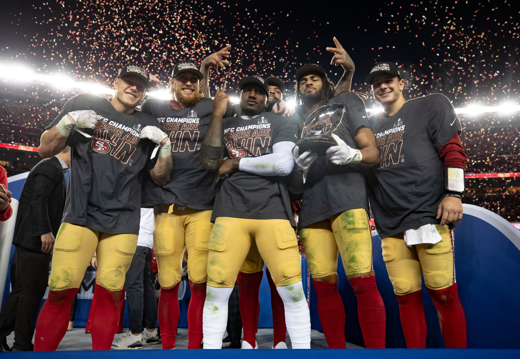 SANTA CLARA, CA - JANUARY 28: Christian McCaffrey #23, George Kittle #85, Deebo Samuel #19, Trent Williams #71, Fred Warner #54 and Brock Purdy #13 of the San Francisco 49ers celebrate after the NFC Championship game against the Detroit Lions at Levi's Stadium on January 28, 2024 in Santa Clara, California. The 49ers defeated the Lions 34-31. (Photo by Michael Zagaris/San Francisco 49ers/Getty Images)