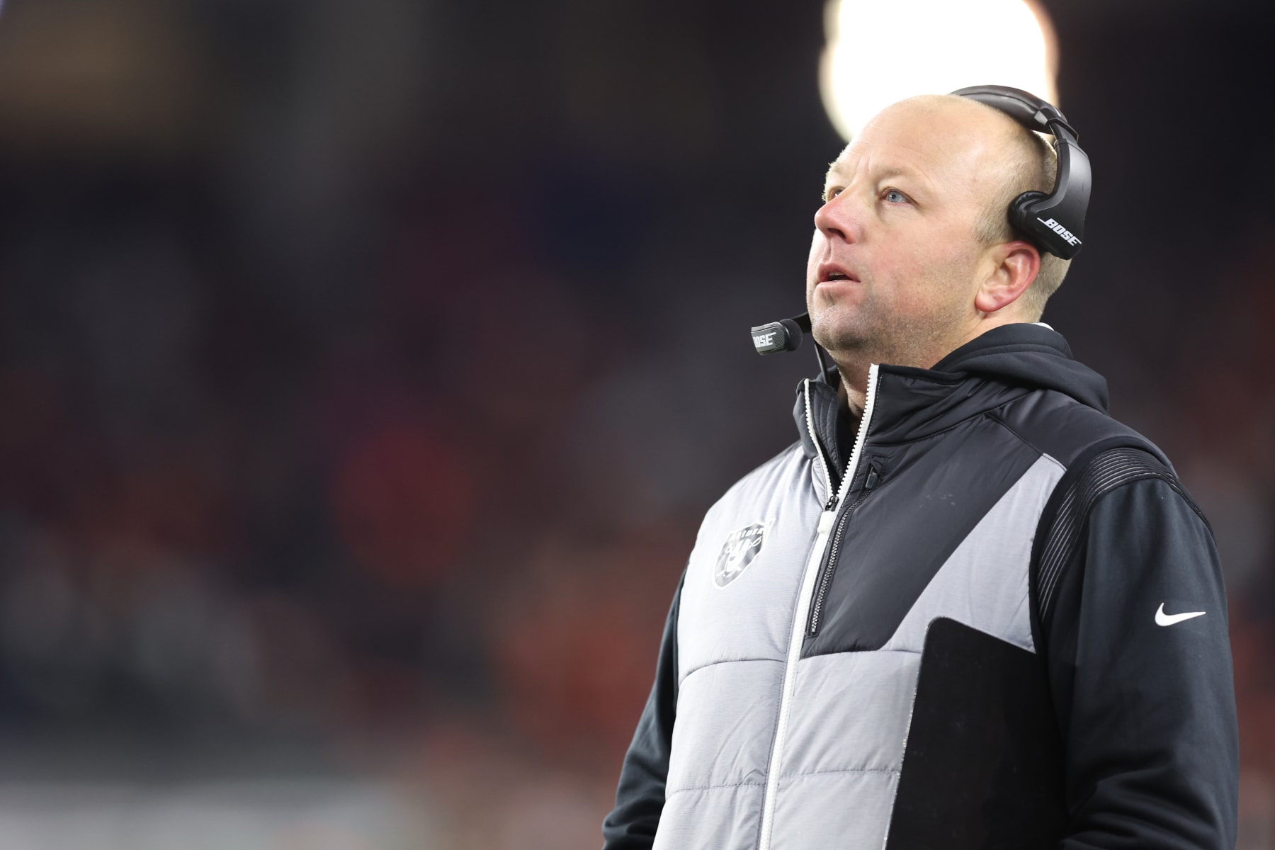 CINCINNATI, OH - JANUARY 15: Las Vegas Raiders assistant wide receivers coach Nick Holz on the sideline during the AFC Wild Card playoff game against the Cincinnati Bengals at Paul Brown Stadium on January 15, 2022 in Cincinnati, Ohio. (Photo by Perry Knotts/Getty Images)