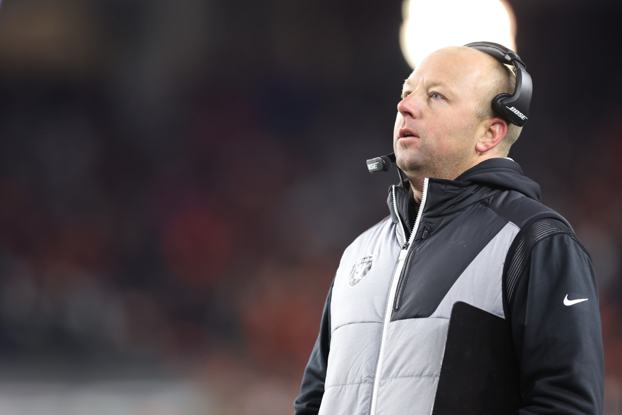 CINCINNATI, OH - JANUARY 15: Las Vegas Raiders assistant wide receivers coach Nick Holz on the sideline during the AFC Wild Card playoff game against the Cincinnati Bengals at Paul Brown Stadium on January 15, 2022 in Cincinnati, Ohio. (Photo by Perry Knotts/Getty Images)