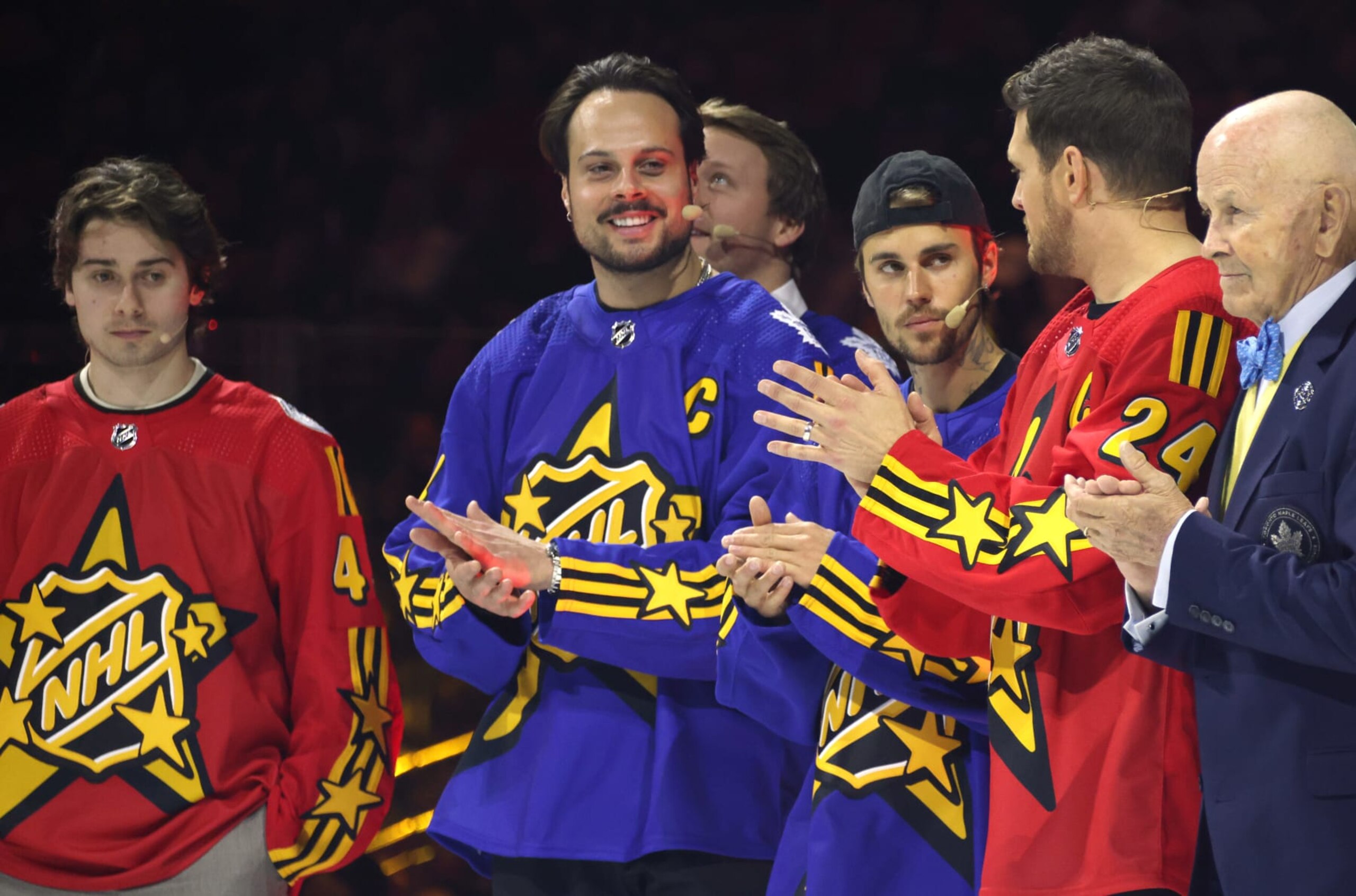 TORONTO, ONTARIO - FEBRUARY 01: (L-R) Quinn Hughes, Auston Matthews, Justin Bieber, Michael Buble and Dave Keon participate in the Tim Horton's NHL All-Star Player Draft at Scotiabank Arena on February 01, 2024 in Toronto, Ontario. (Photo by Dave Sandford/NHLI via Getty Images)