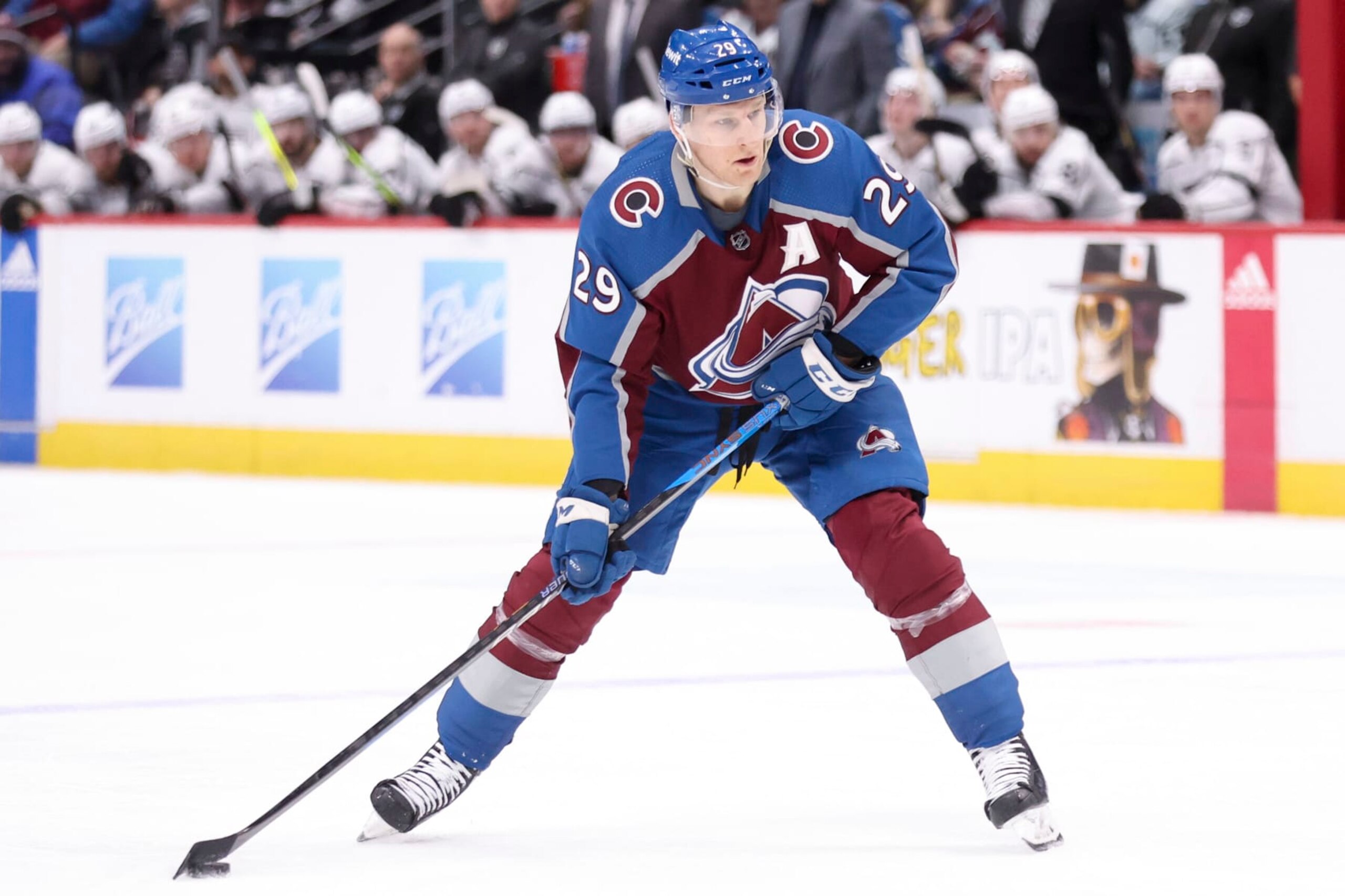 DENVER, COLORADO - JANUARY 26: Nathan MacKinnon #29 of the Colorado Avalanche looks to make a shot on goal against the Los Angeles Kings at Ball Arena on January 26, 2024 in Denver, Colorado. (Photo by Tyler Schank/Getty Images)